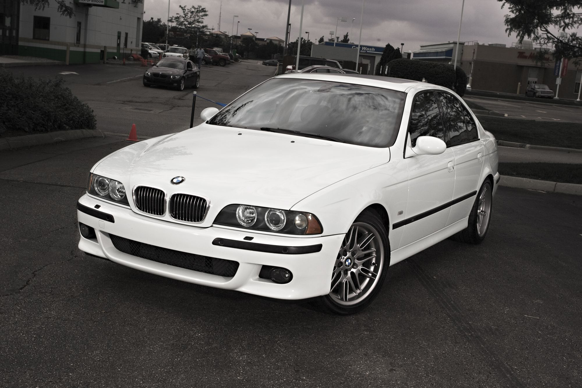 Front Bumper with Fog Lights on White BMW 5-Series - Photo by dan kinzie