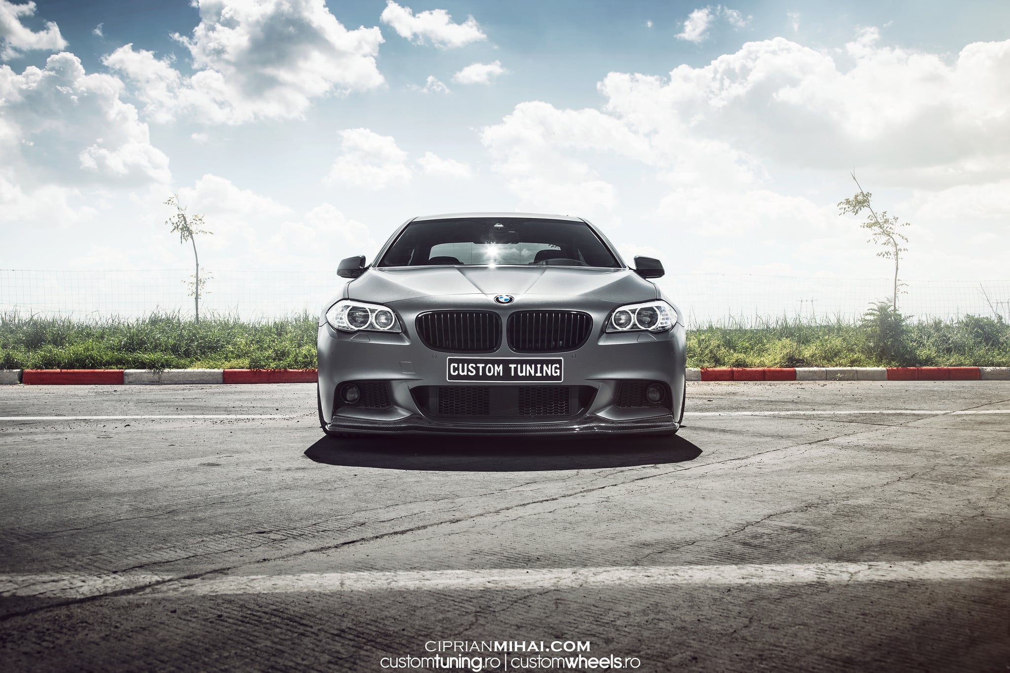 Custom Halo Headlights on Gray BMW 5-Series - Photo by Ciprian Mihai
