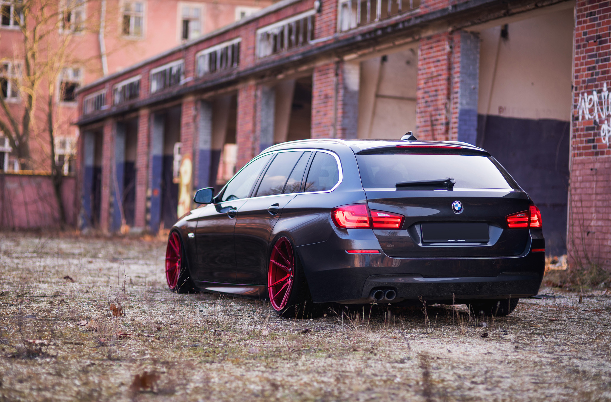Red LED Taillights on Black BMW 5-Series - Photo by JR Wheels
