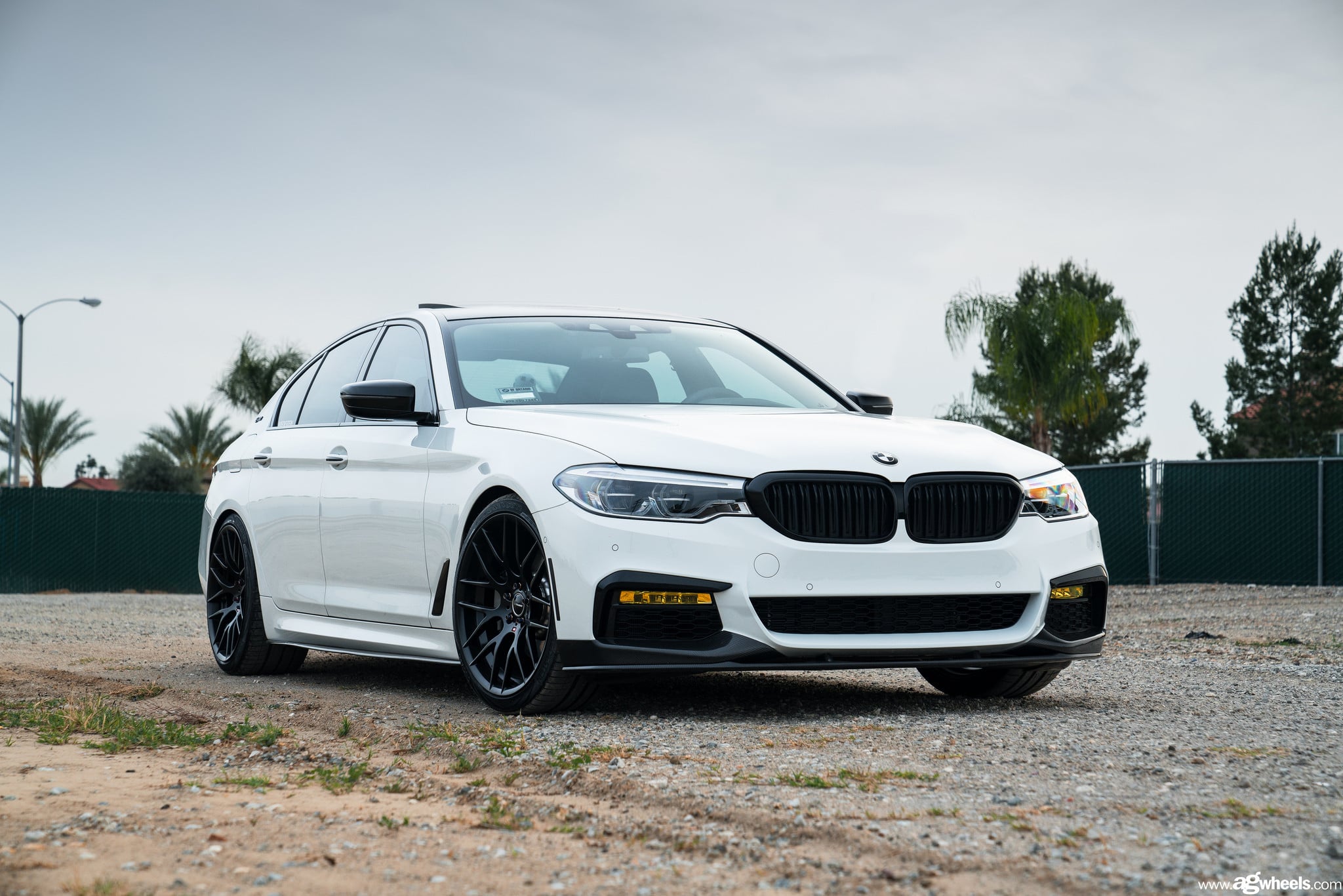 Custom Dark Smoke Headlights on White BMW 5-Series - Photo by Avant Garde Wheels