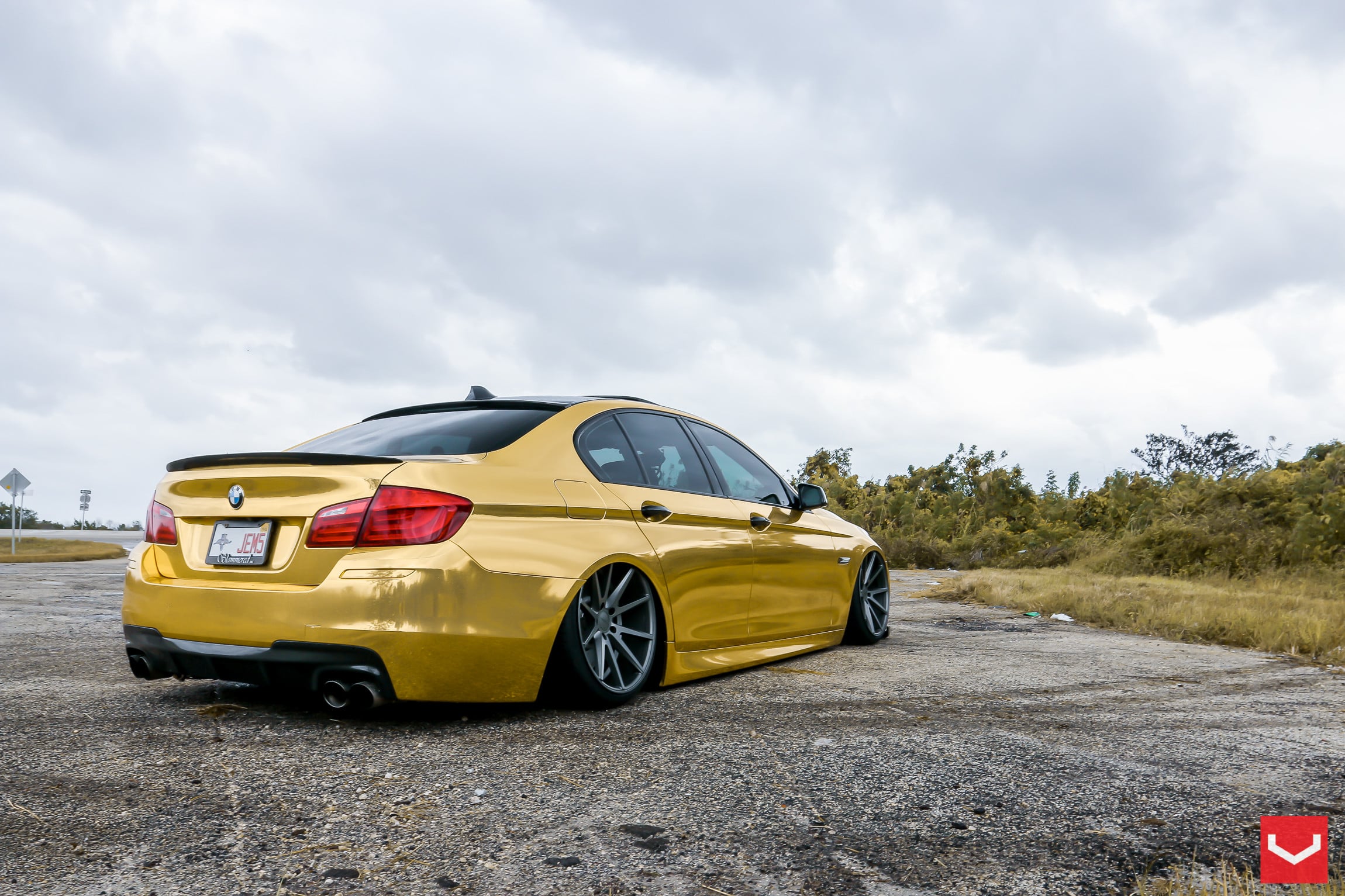 Aftermarket Rear Lip Spoiler on Gold Lowered BMW 5-Series - Photo by Vossen