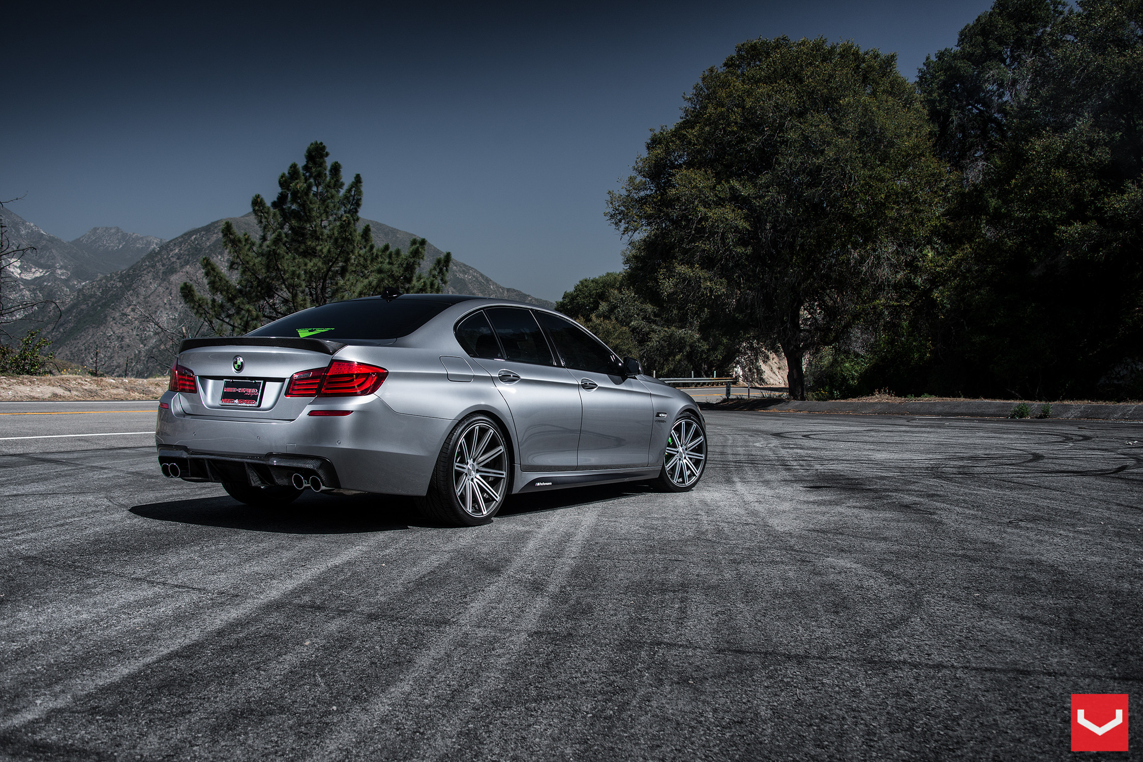 Carbon Fiber Rear Spoiler on BMW 5-Series - Photo by Vossen