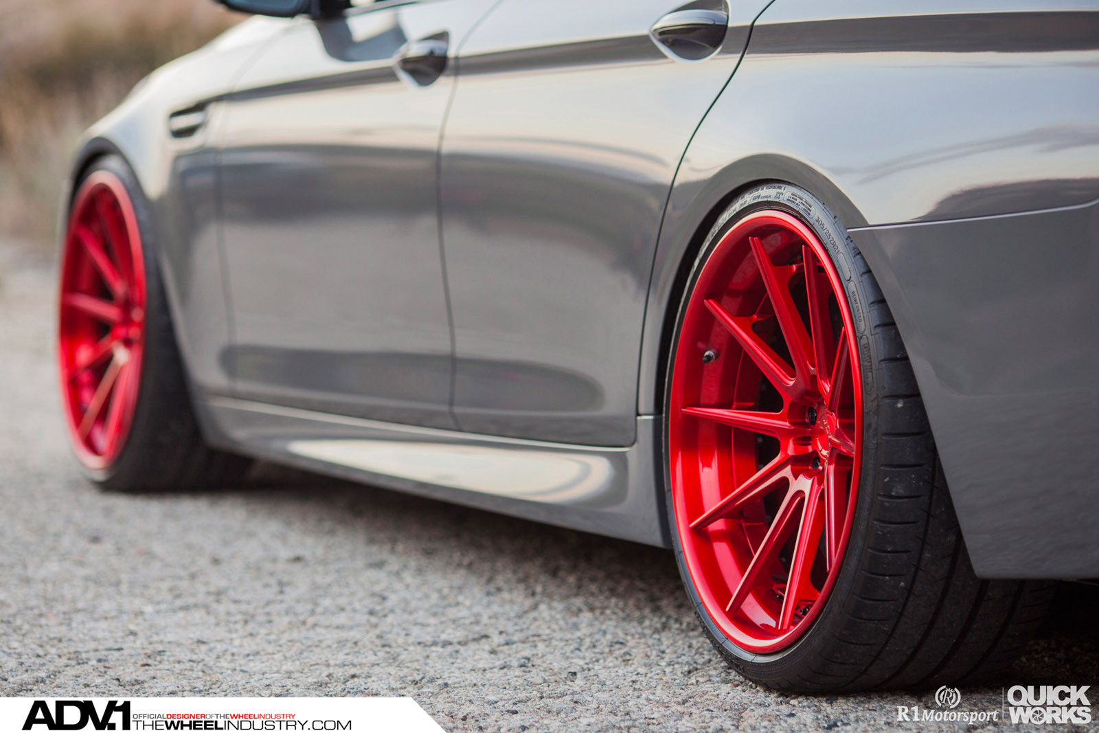 Gray BMW M5 with Custom Red ADV1 Wheels - Photo by ADV.1
