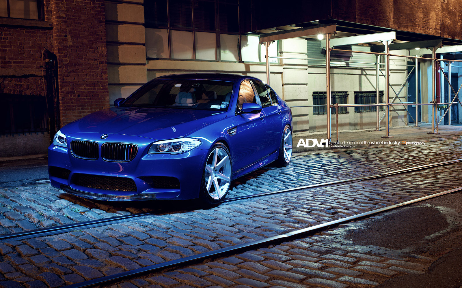 Custom Blue BMW M5 with DRL Bar Headlights - Photo by ADV.1
