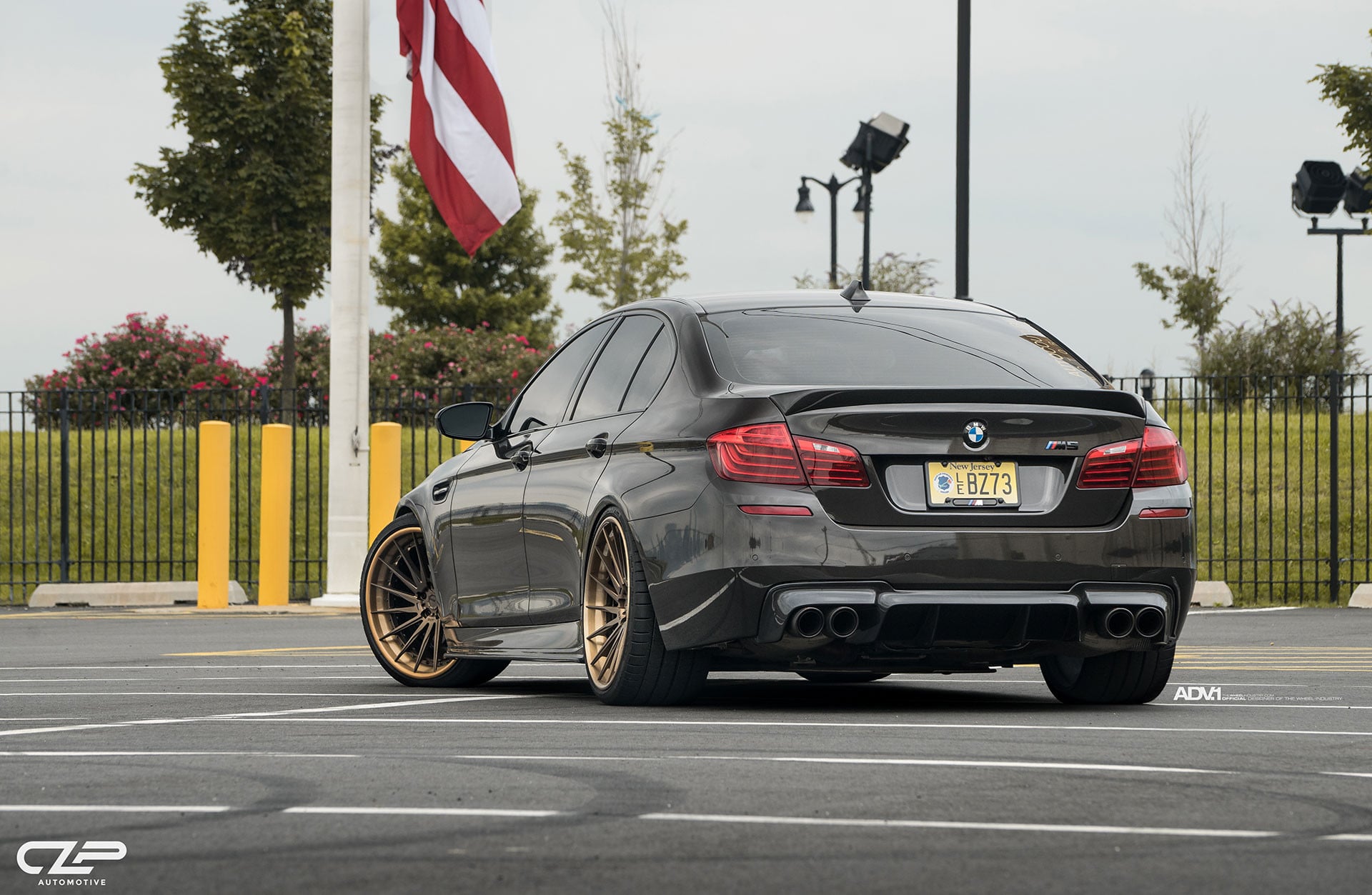 Custom Rear Diffuser on Gray BMW 5-Series - Photo by ADV.1