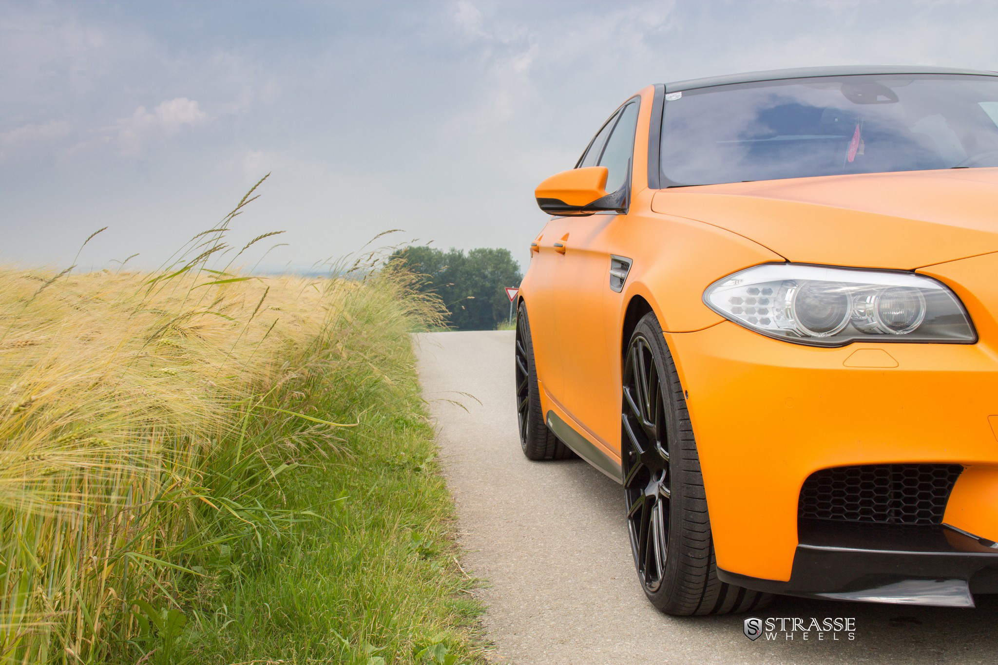 Matte Orange BMW 5-Series with Custom Strasse Rims - Photo by Strasse Forged