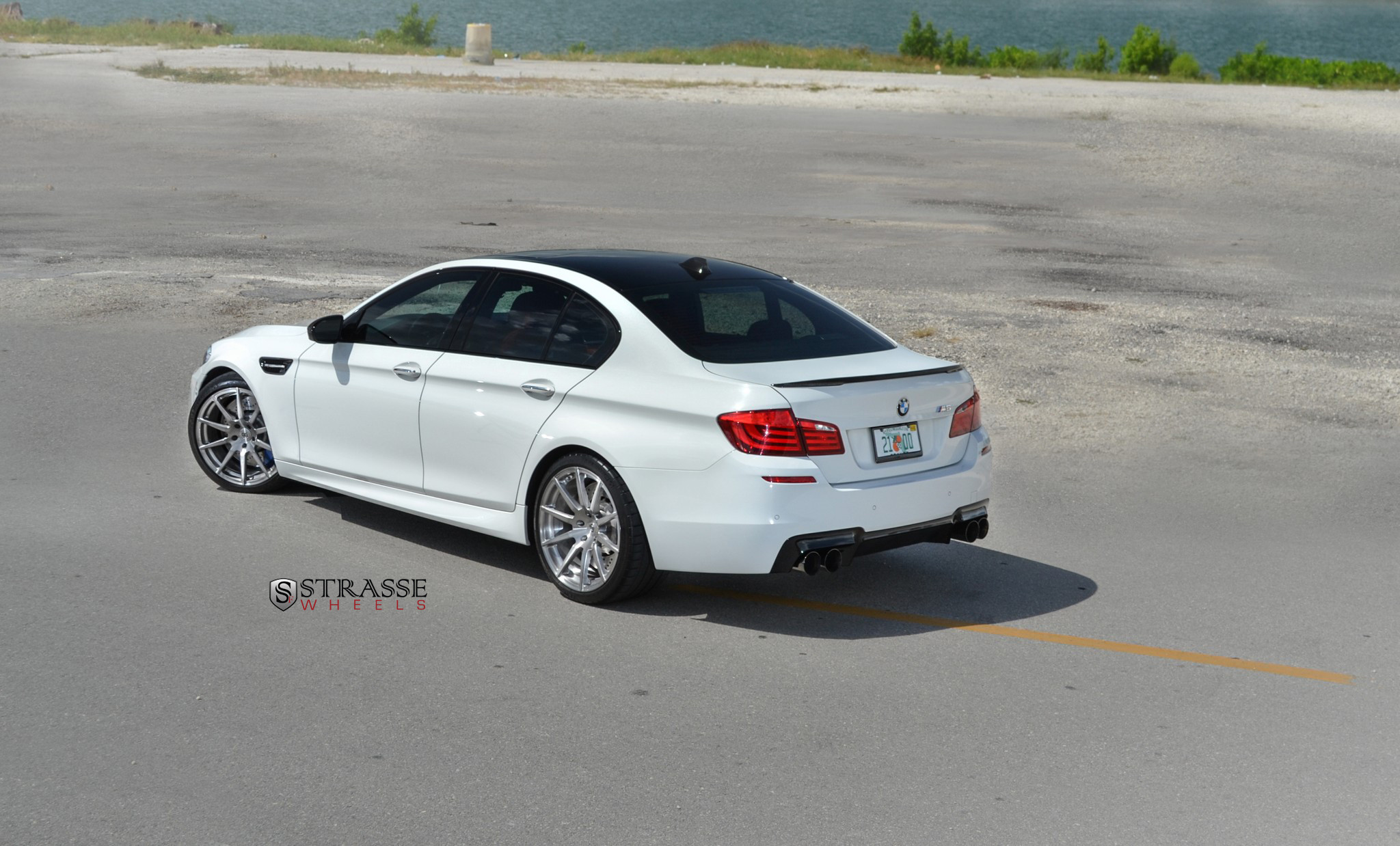 Factory Style Rear Spoiler on White BMW 5-Series - Photo by Strasse Forged