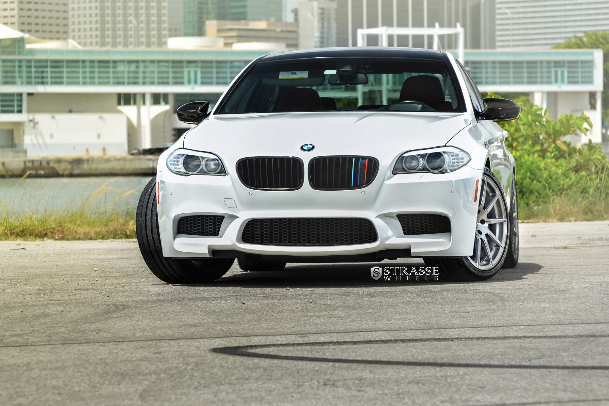 White BMW 5-Series with Aftermarket Headlights - Photo by Strasse Forged