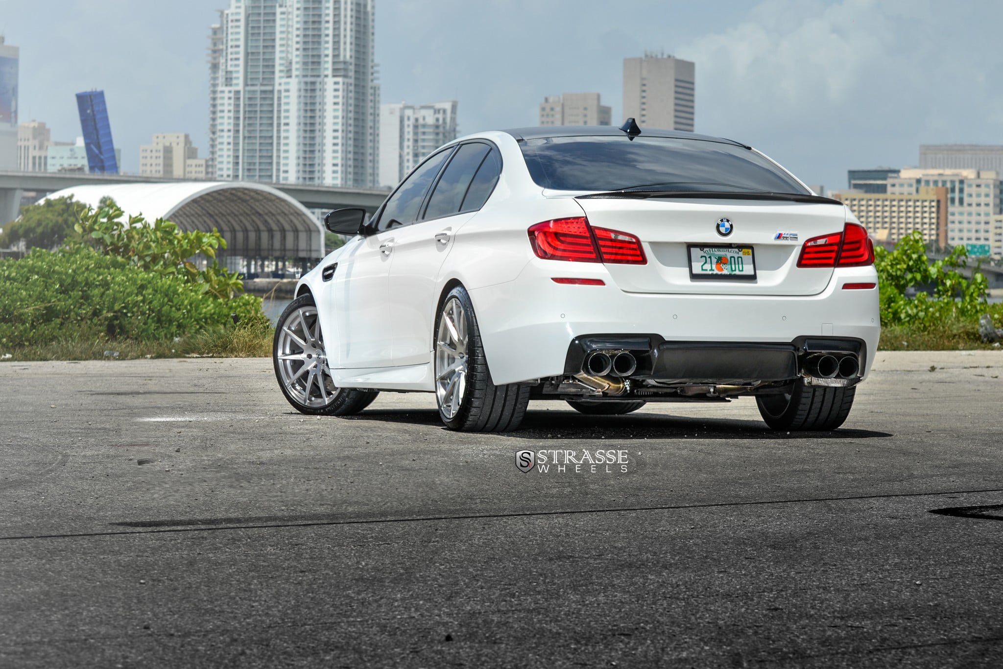 White BMW 5-Series with Custom Exhaust System - Photo by Strasse Forged