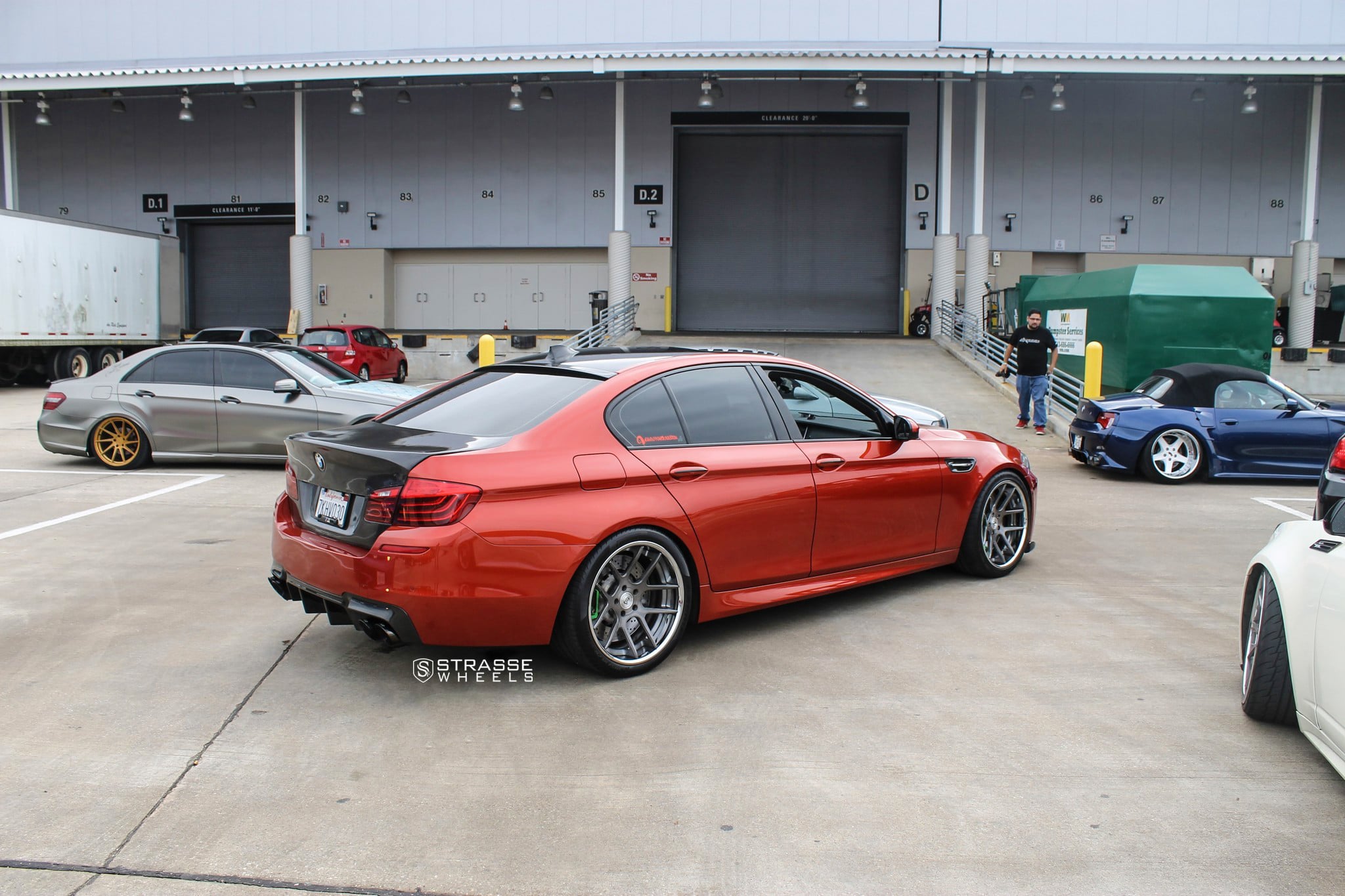 Red BMW 5-Series with Aftermarket Rear Bumper - Photo by Strasse Forged