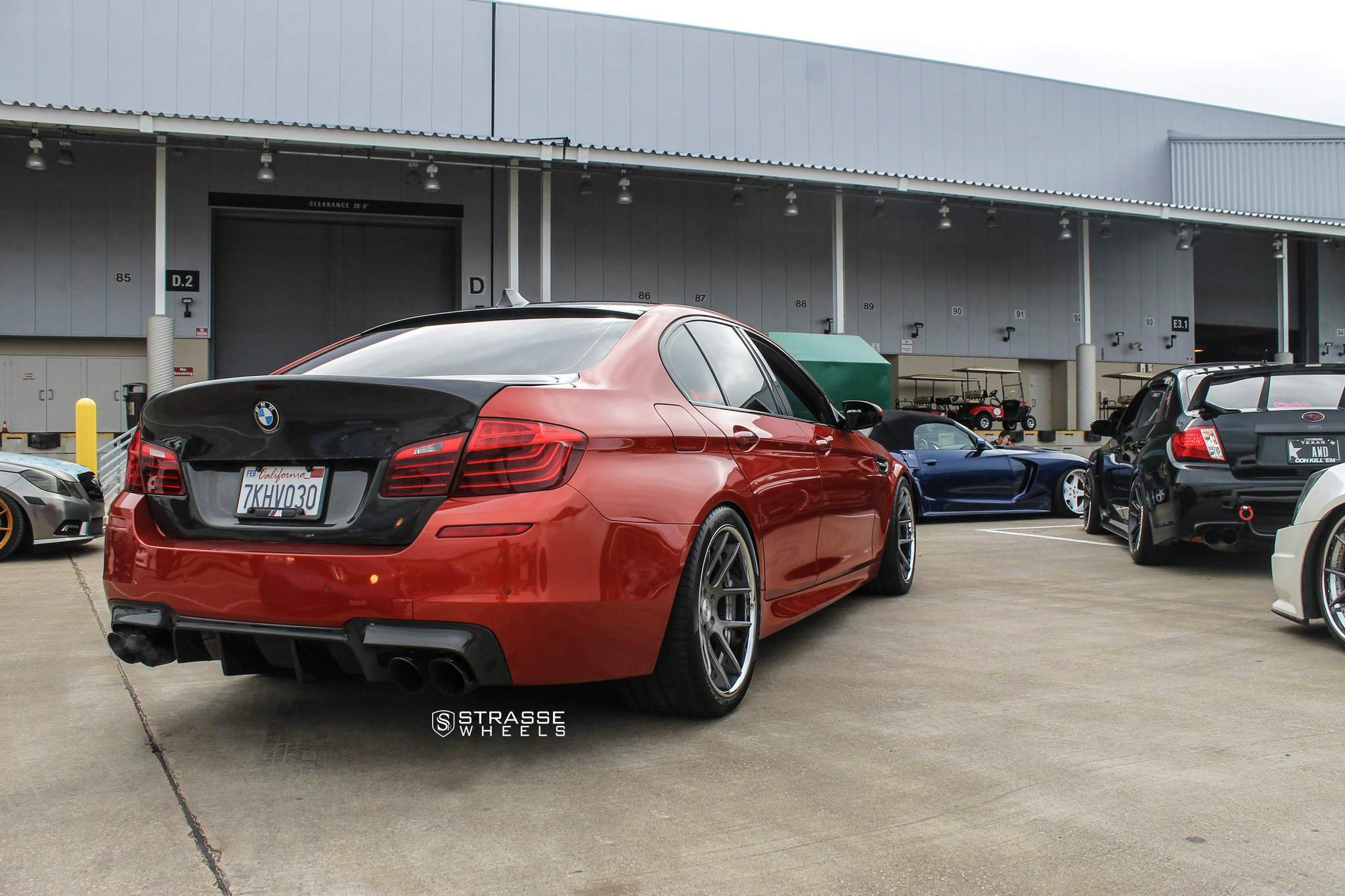 Custom Black Rear Diffuser on Red BMW 5-Series - Photo by Strasse Forged