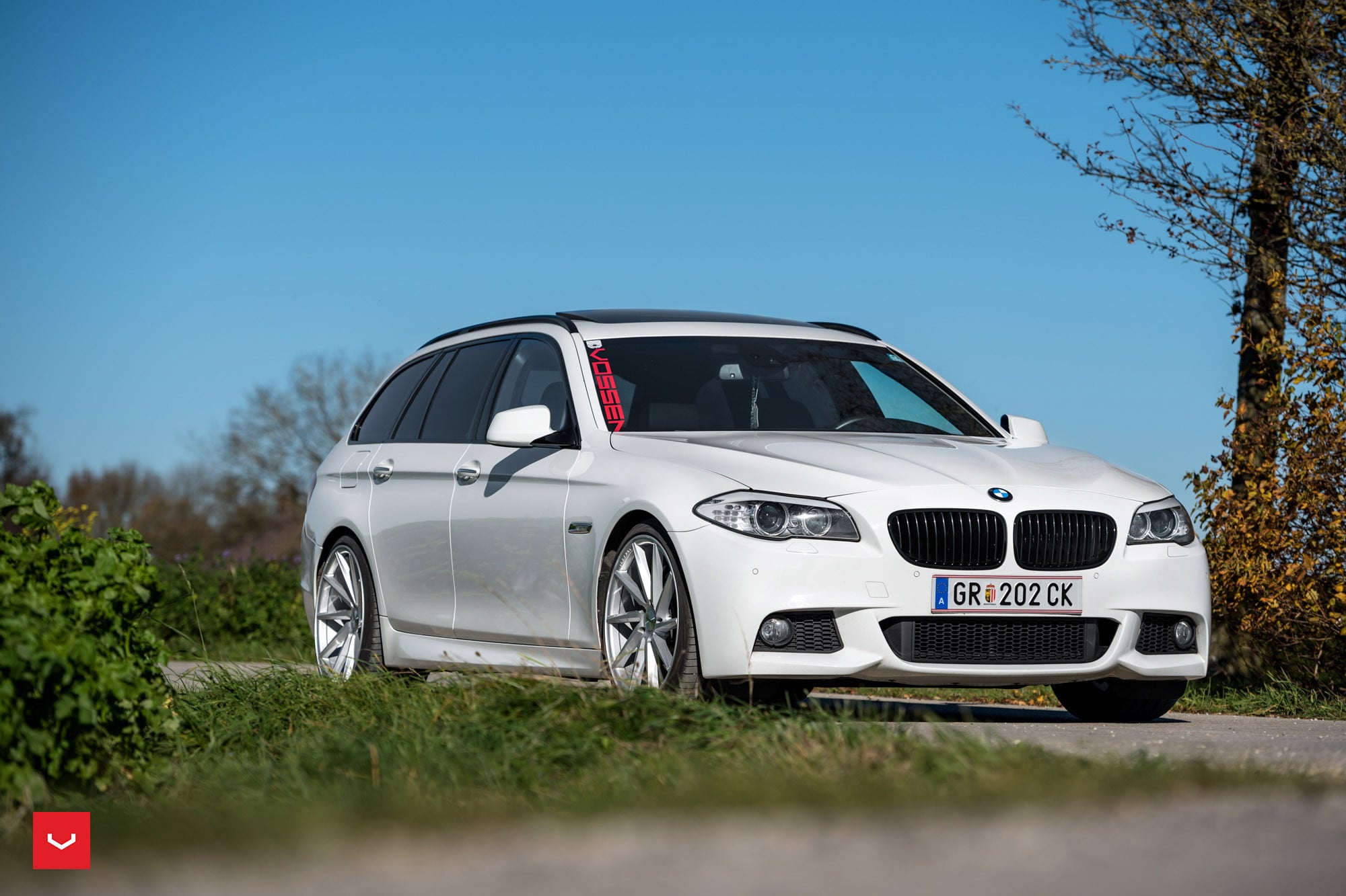 White BMW 5-Series with Aftermarket Front Bumper - Photo by Vossen