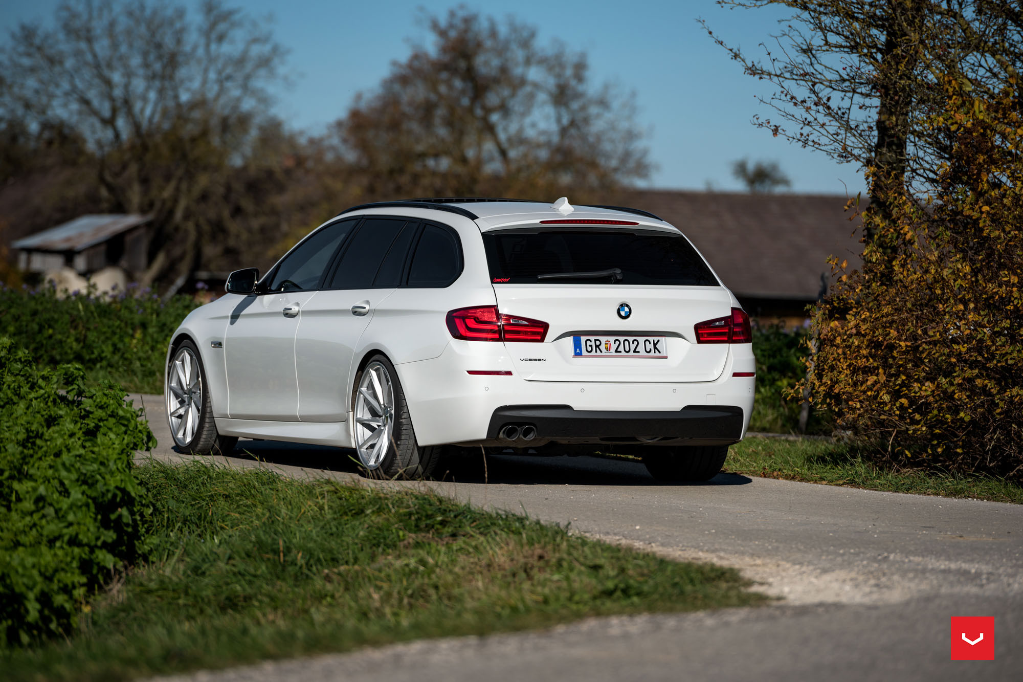 Custom Red LED Taillights on White BMW 5-Series - Photo by Vossen