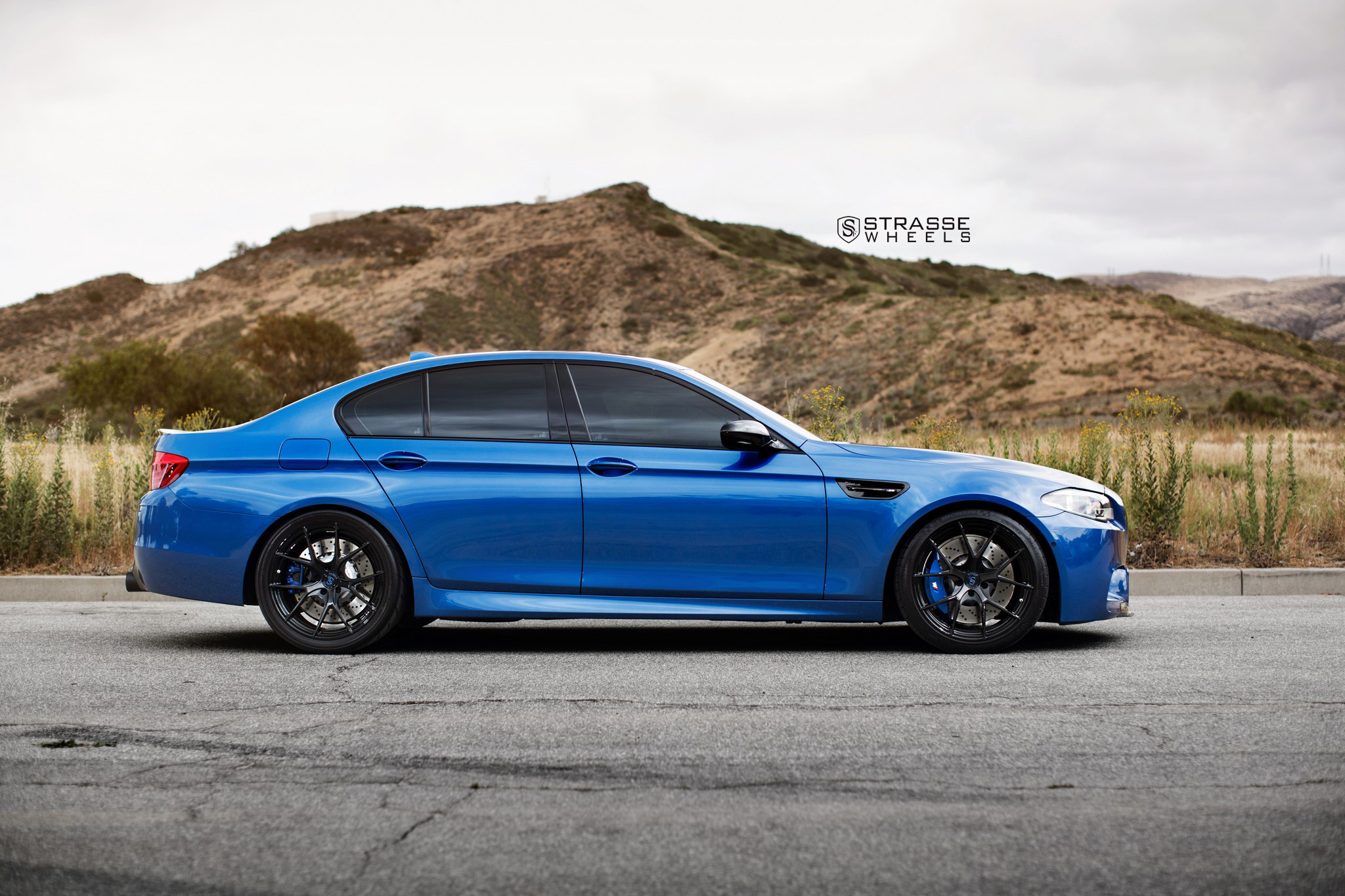 Custom Blue BMW 5-Series Side Skirts - Photo by Strasse Forged