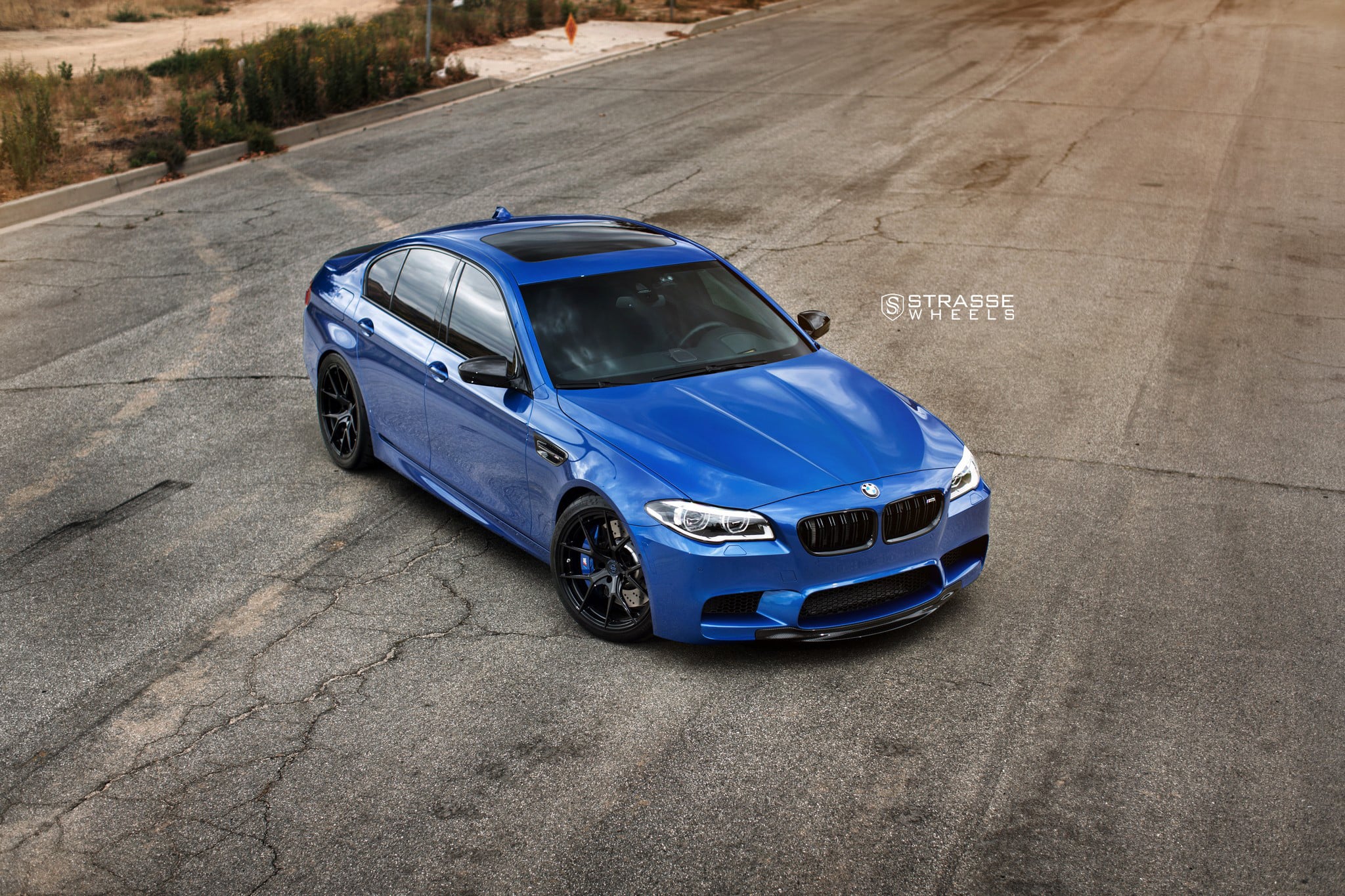 Matte Black Strasse Wheels on Blue BMW 5-Series - Photo by Strasse Forged