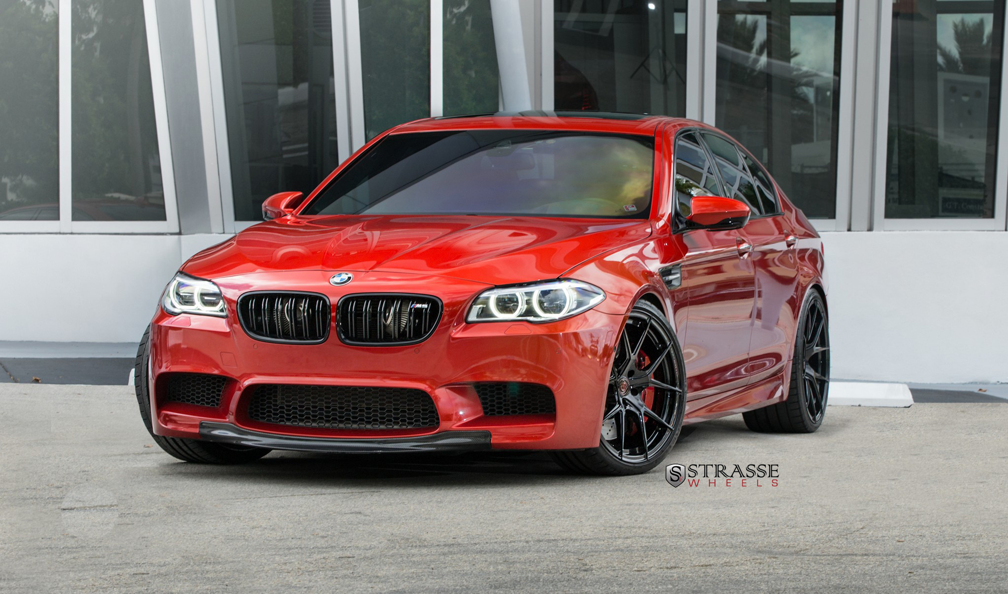 Red BMW 5-Series with Carbon Fiber Front Lip - Photo by Strasse Forged