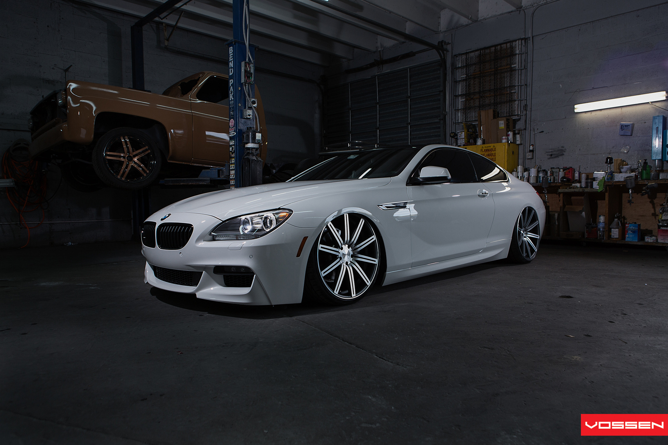 Lowered White BMW 6-Series with Aftermarket Headlights - Photo by Vossen