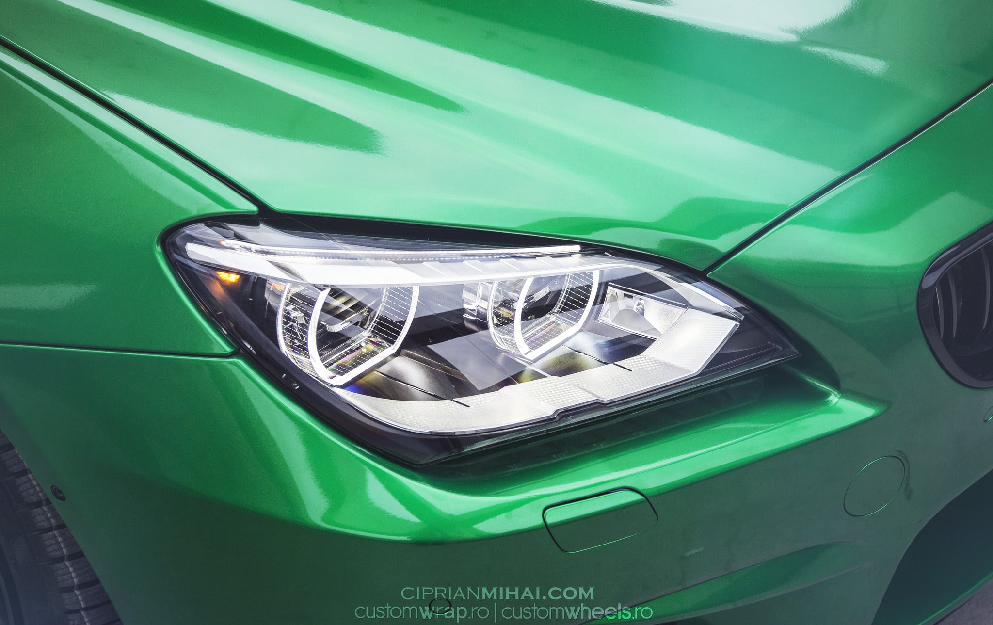 Aftermarket Halo Headlights on Green BMW 6-Series - Photo by Ciprian Mihai