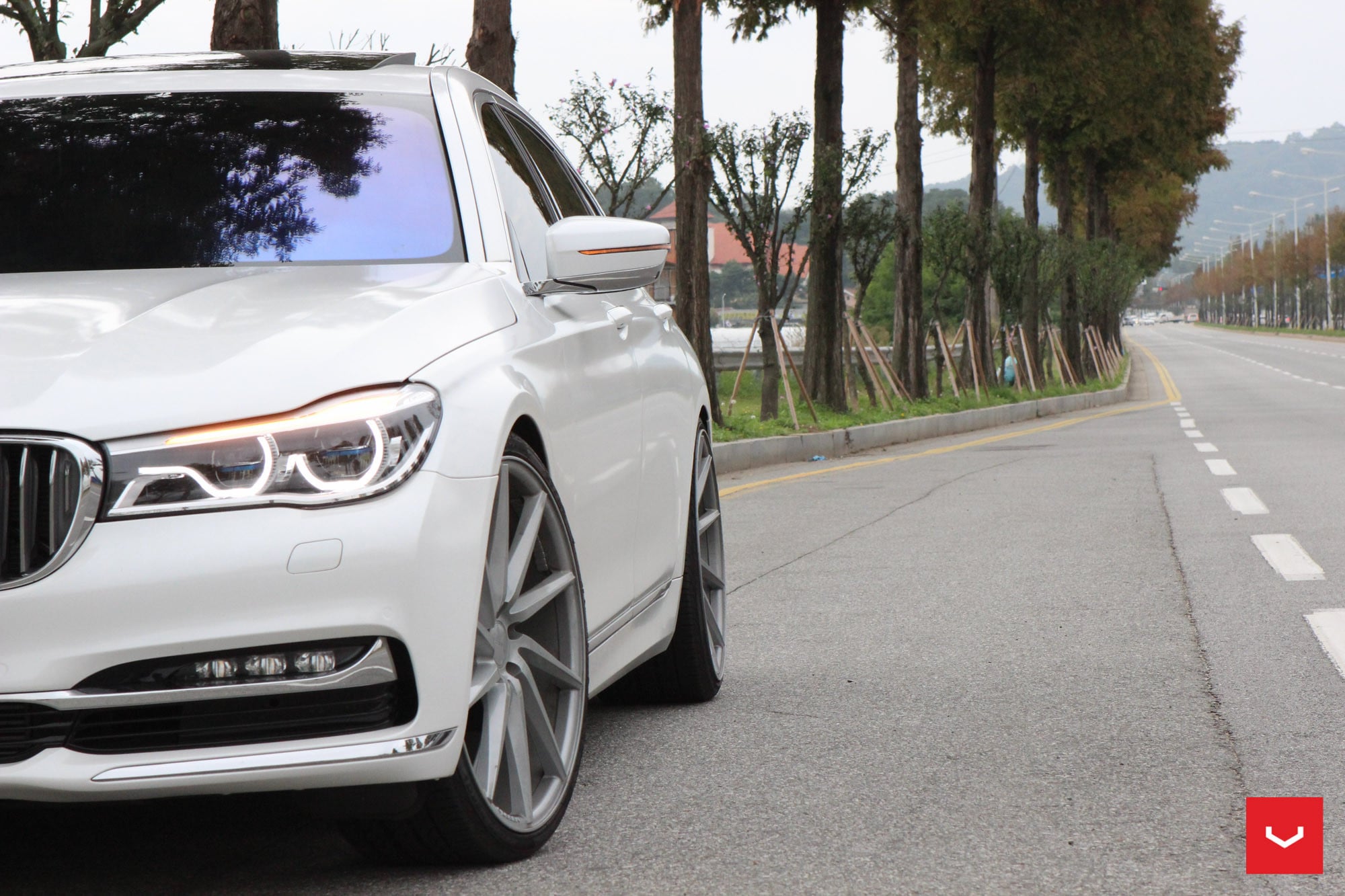 Light Smoke Matte Vossen Wheels on White BMW 7-Series - Photo by Vossen