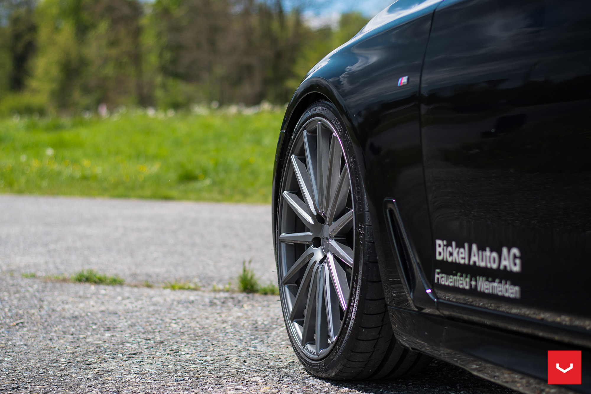 Black BMW 7-Series with Dark Smoke Vossen VFS Rims - Photo by Vossen