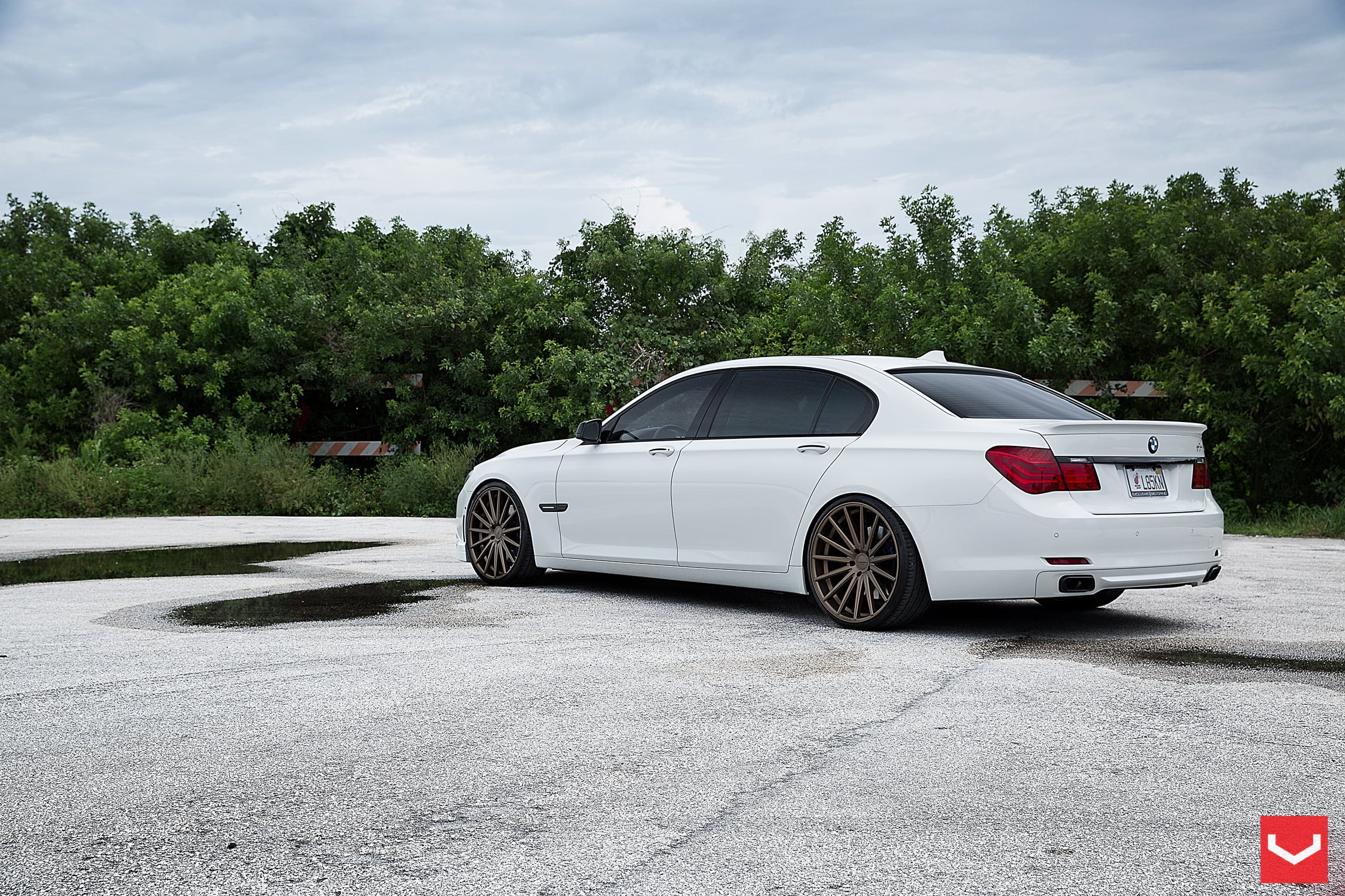 Aftermarket Rear Lip Spoiler on White BMW 7-Series - Photo by Vossen