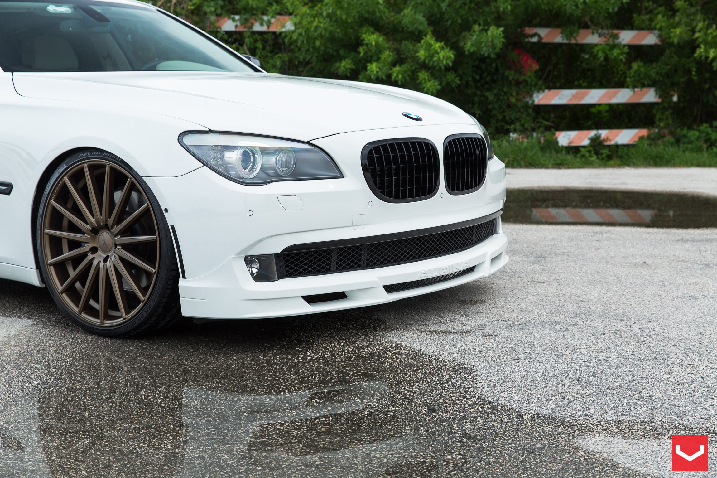 Patina Gold Vossen Wheels on White BMW 7-Series - Photo by Vossen
