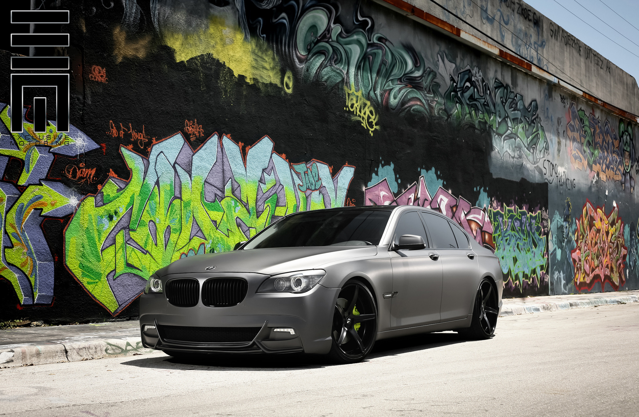 Matte Gray BMW M7 on black Forgiato rims - Photo by Exclusive Motoring