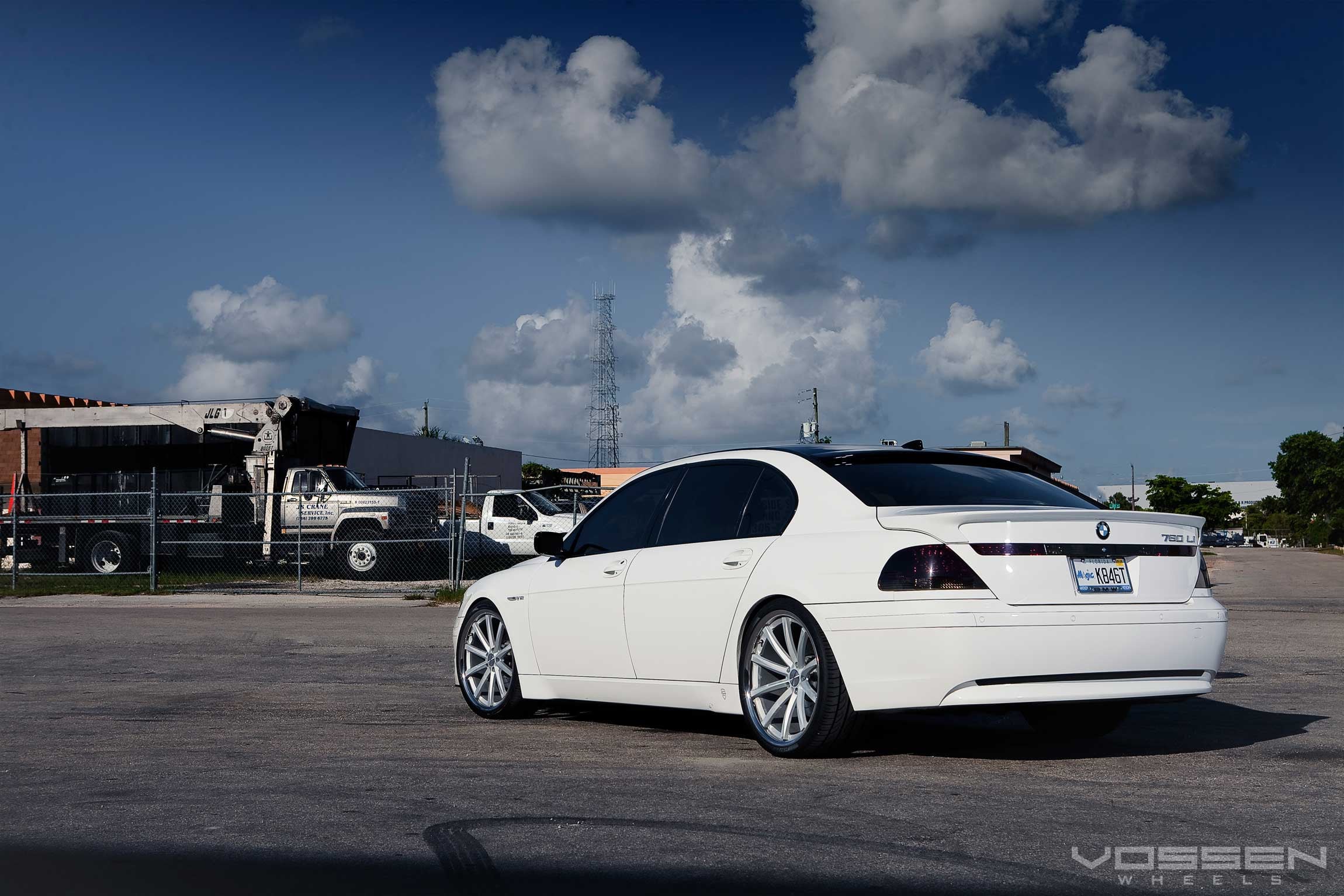 White BMW 7-Series with Aftermarket Spoiler - Photo by Vossen