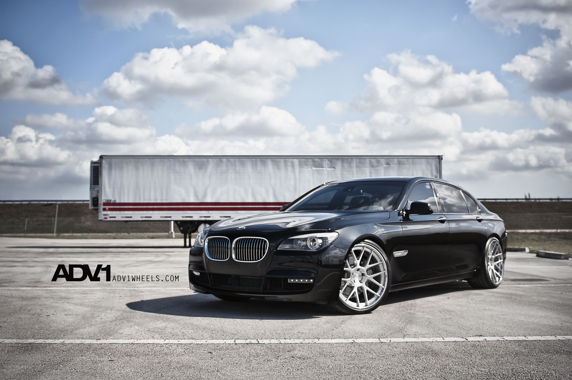 Gloss Black BMW 7-Series with Custom Front Bumper - Photo by ADV.1