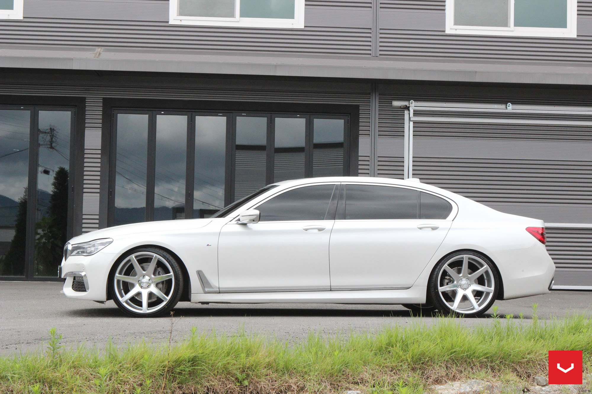 Chrome Bodyside Moldings on White BMW 7-Series - Photo by Vossen