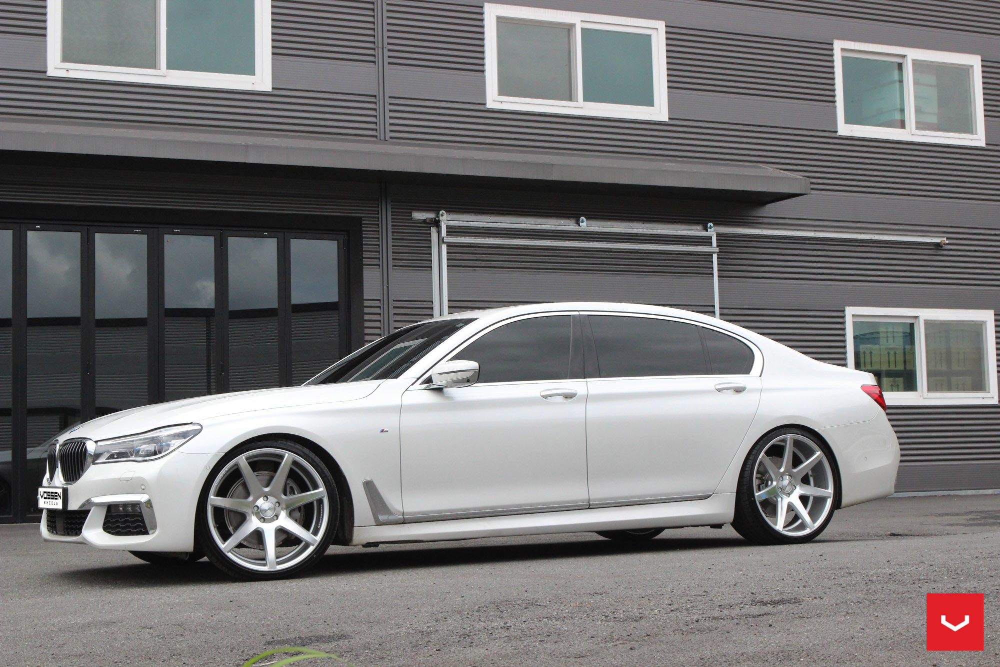 White BMW 7-Series Custom Front Bumper - Photo by Vossen