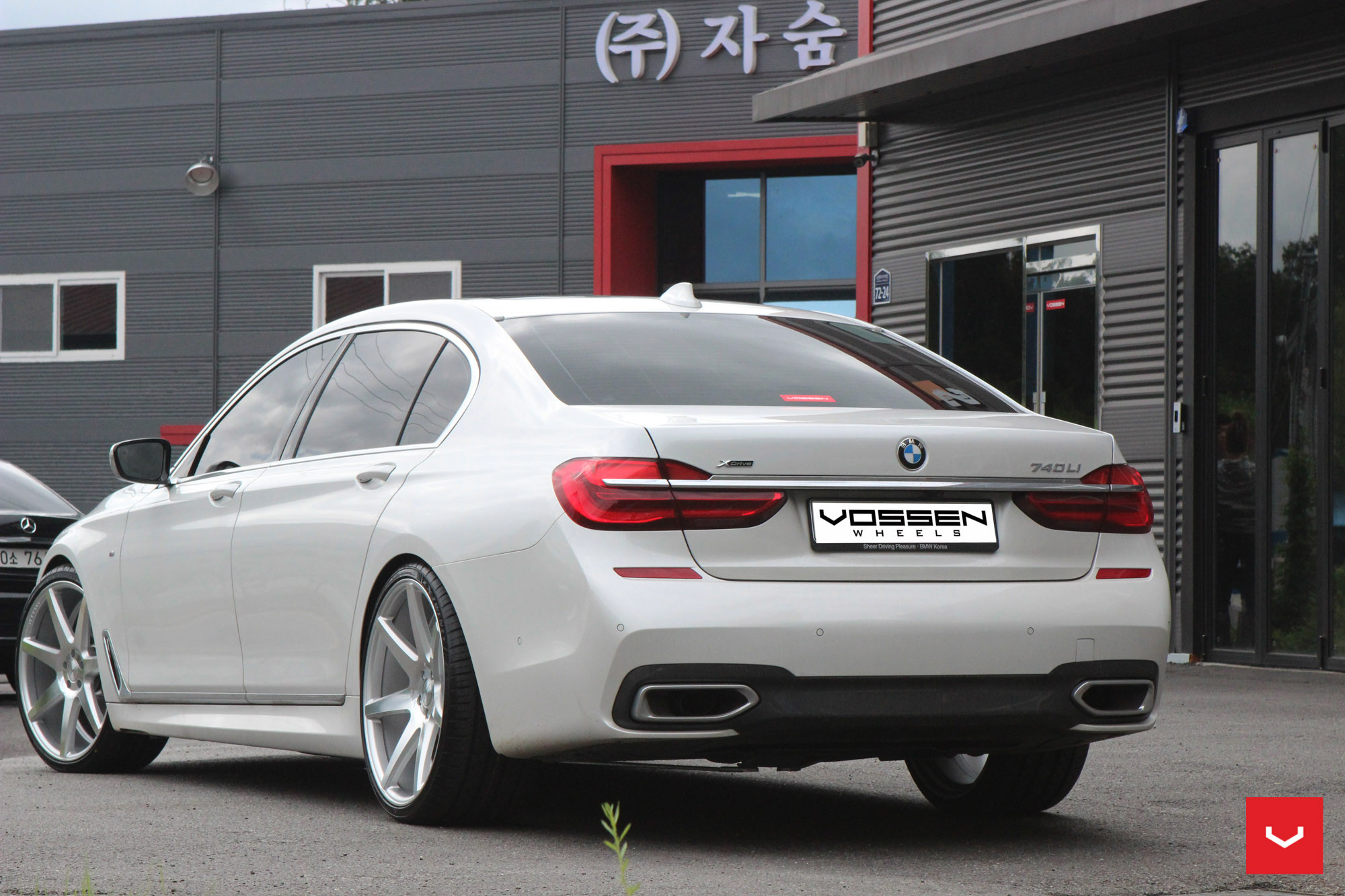 White BMW 7-Series with Custom Rear Diffuser - Photo by Vossen