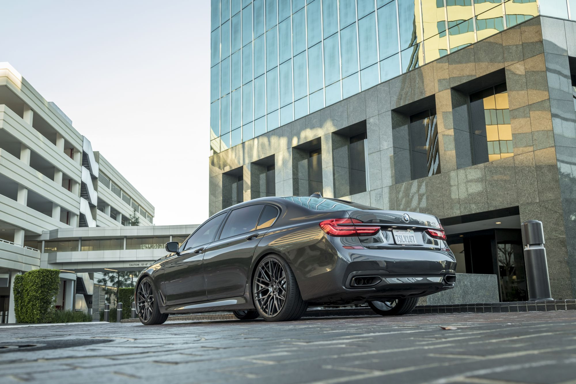 Custom Rear Diffuser on Black BMW 7-Series - Photo by Vorstiner