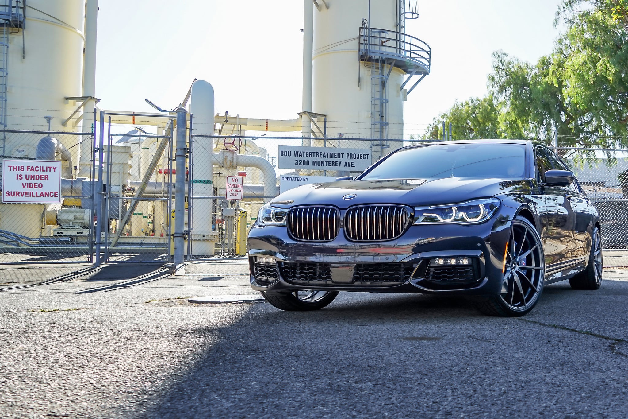 Black BMW 7-Series with Custom Halo Headlights - Photo by VIBE Motorsports