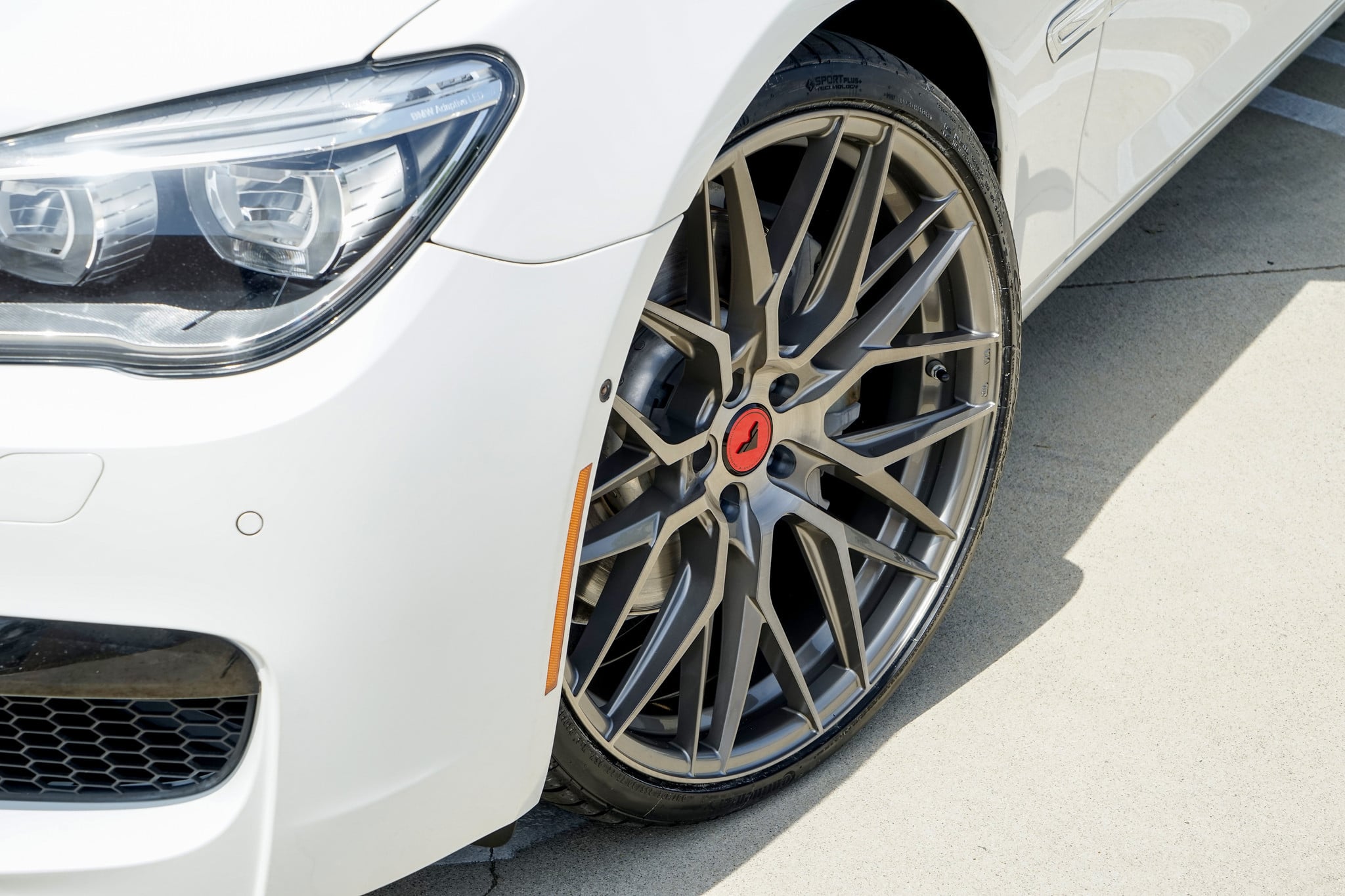 White BMW 7-Series with Custom Vorsteiner Rims - Photo by Vorsteiner