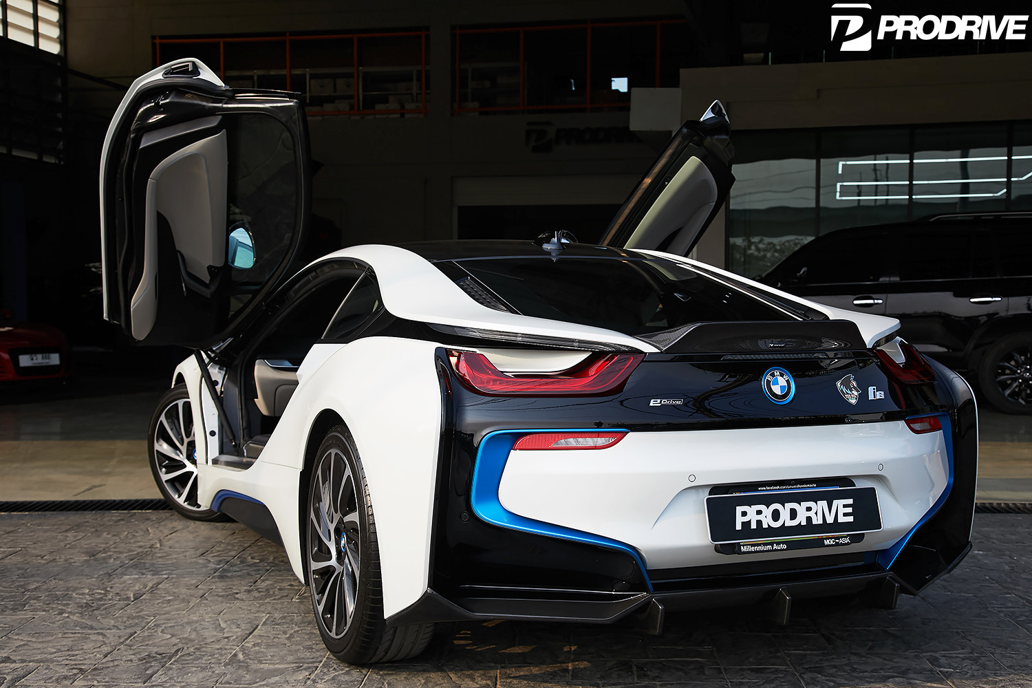 White BMW i8 with Vertical Doors - Photo by Vorsteiner