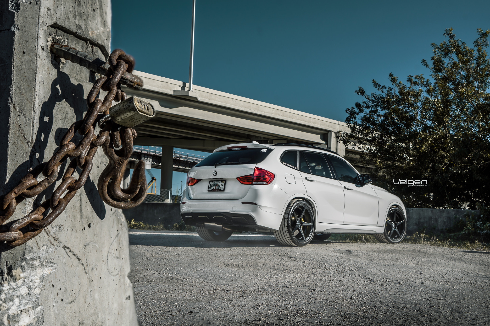 Roofline Spoiler with Light on White BMW X1 - Photo by Velgen
