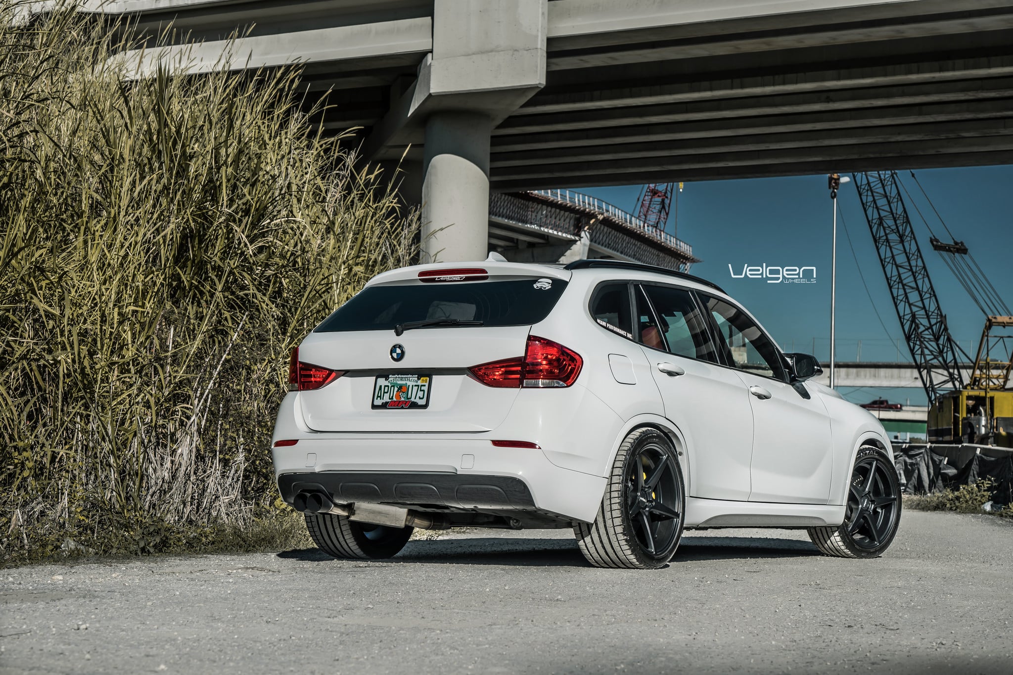 White BMW X1 with Aftermarket Rear Diffuser - Photo by Velgen