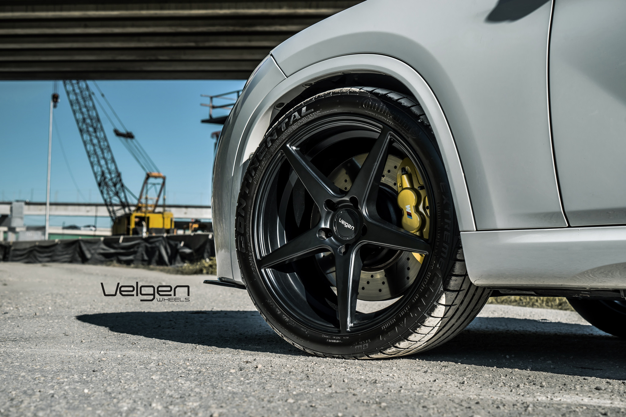 Continental Extreme Tires on White BMW X1 - Photo by Velgen