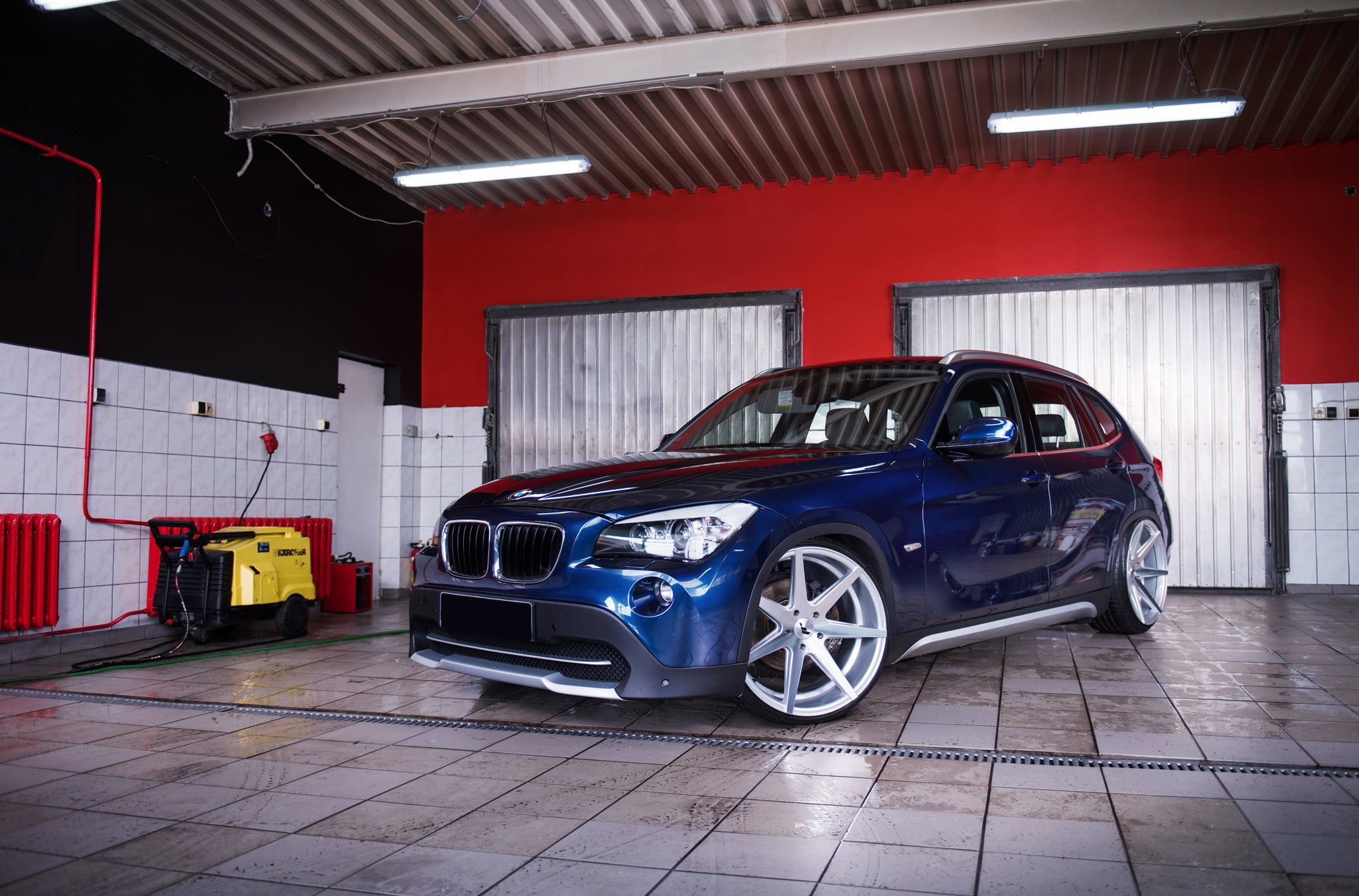 Custom Halo Headlights on Blue BMW X1 - Photo by JR Wheels