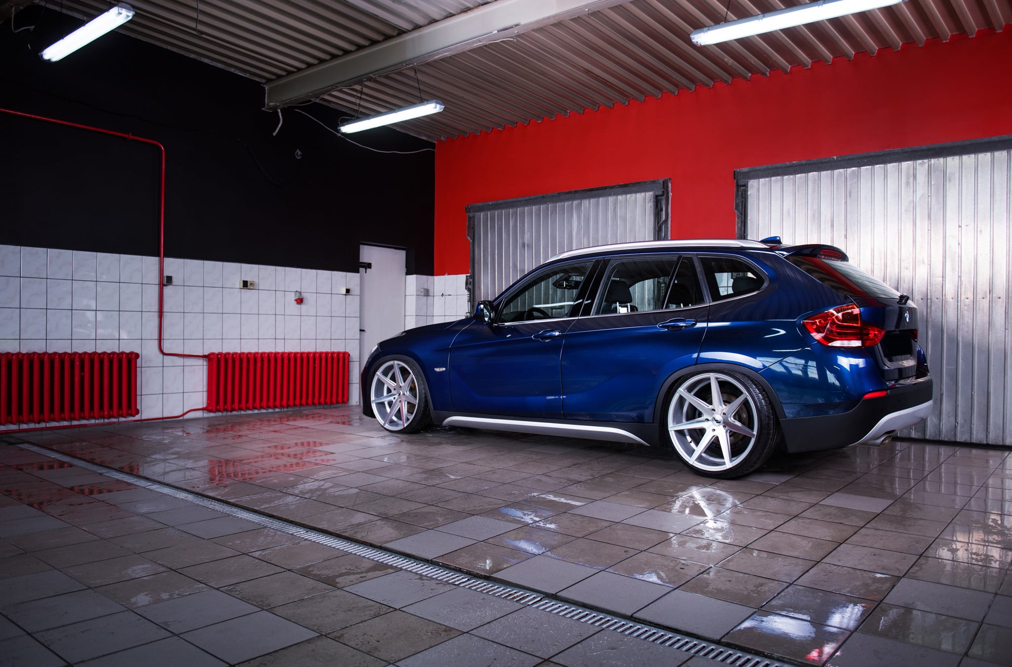 Blue BMW X1 with Red LED Taillights - Photo by JR Wheels