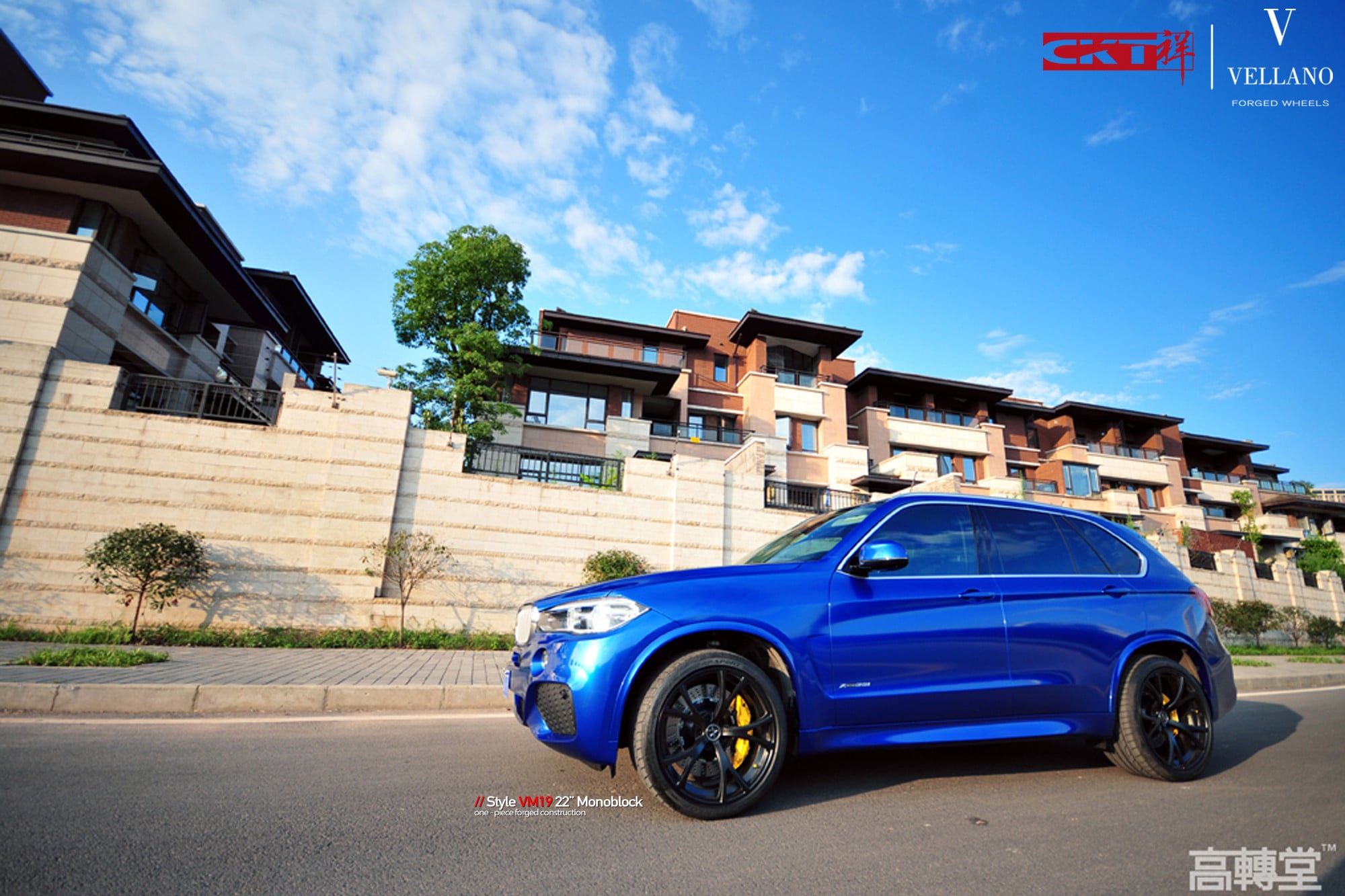 Blue BMW X5 with Aftermarket Side Skirts - Photo by Vellano