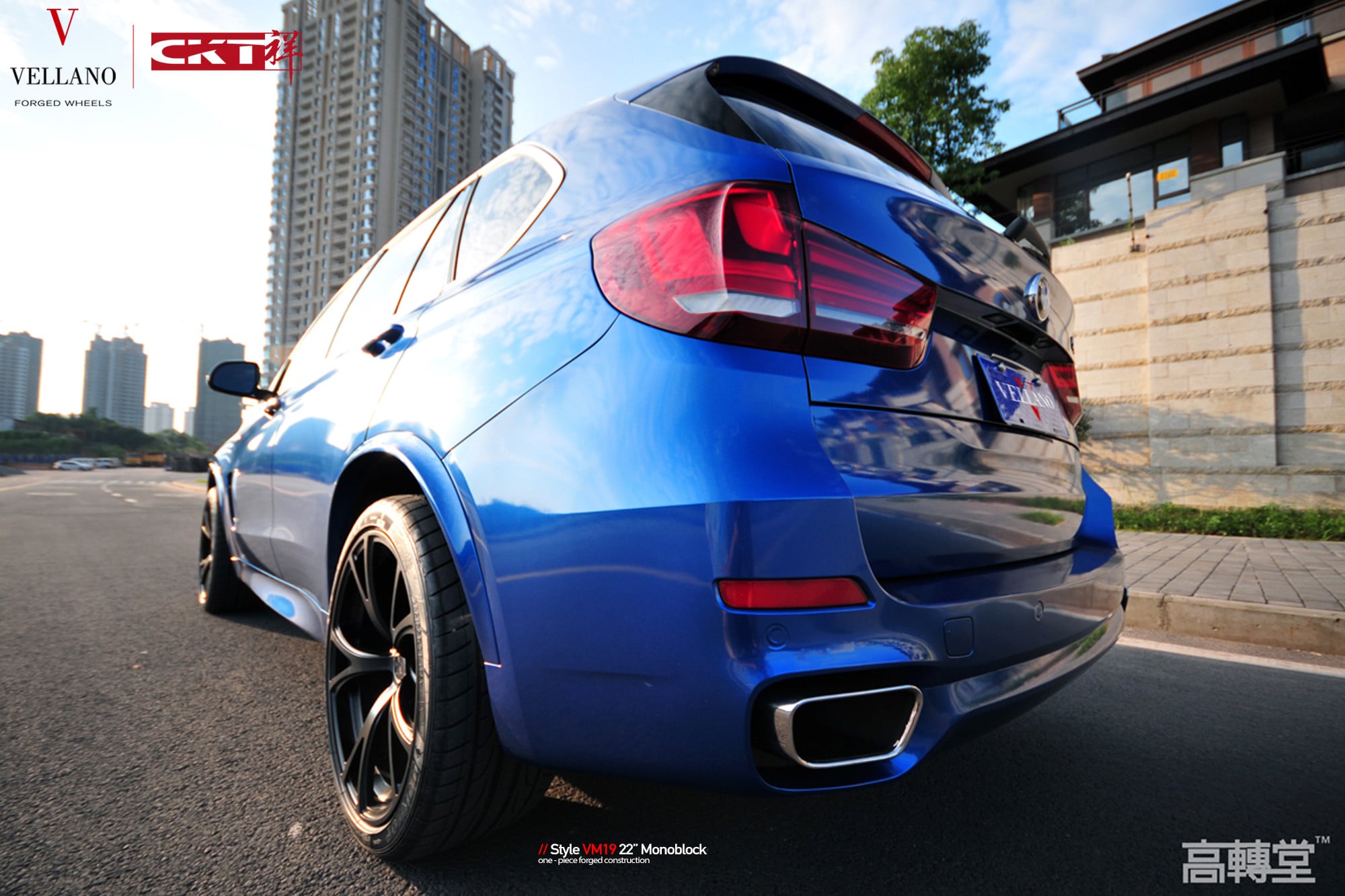 Blue BMW X5 with Custom Roofline Spoiler - Photo by Vellano