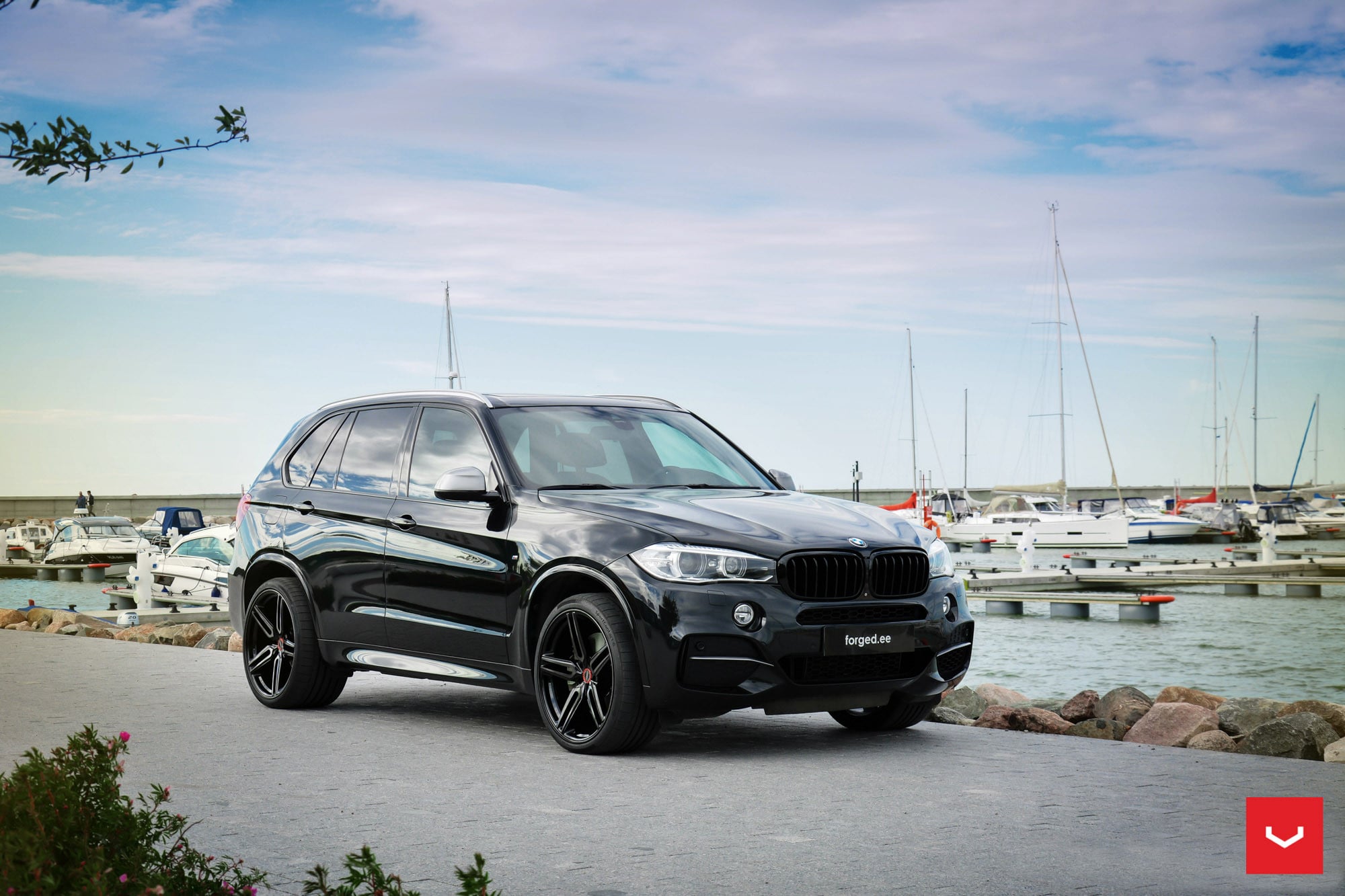 Crystal Clear Halo Headlights on Black BMW X5 - Photo by Vossen