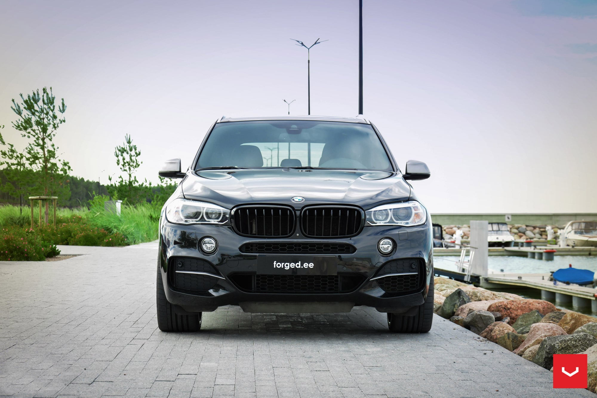 Black BMW X5 with Aftermarket Front Bumper - Photo by Vossen
