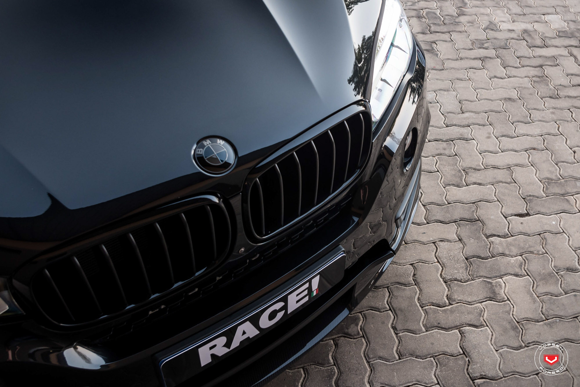 Aftermarket Projector Headlights on Black BMW X5 - Photo by Vossen