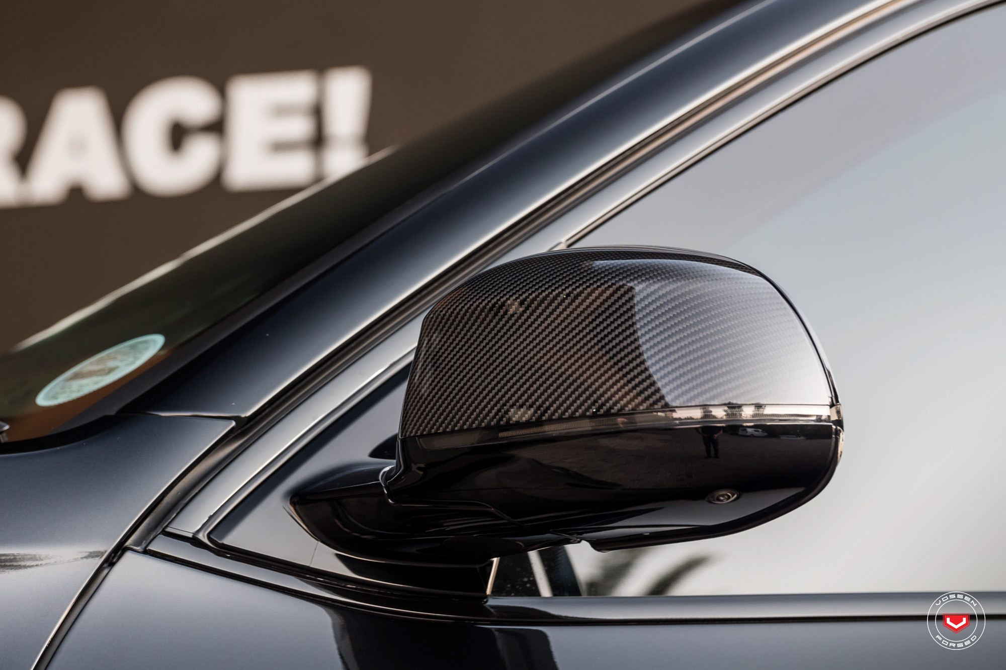 Black BMW X5 with Carbon Fiber Side Mirrors - Photo by Vossen