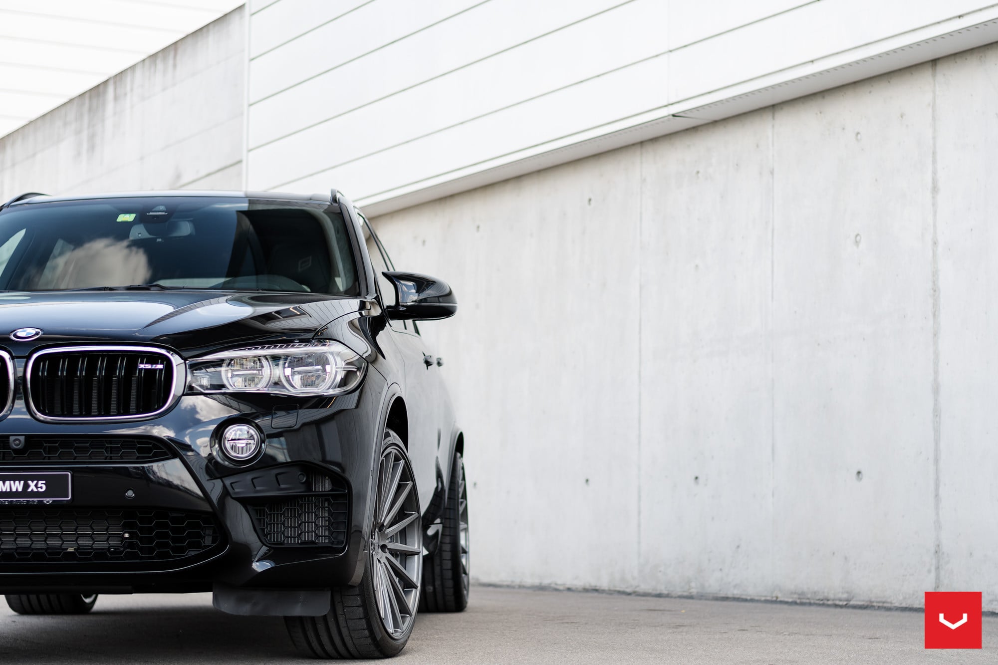 Black BMW X5 with Custom LED Headlights - Photo by Vossen