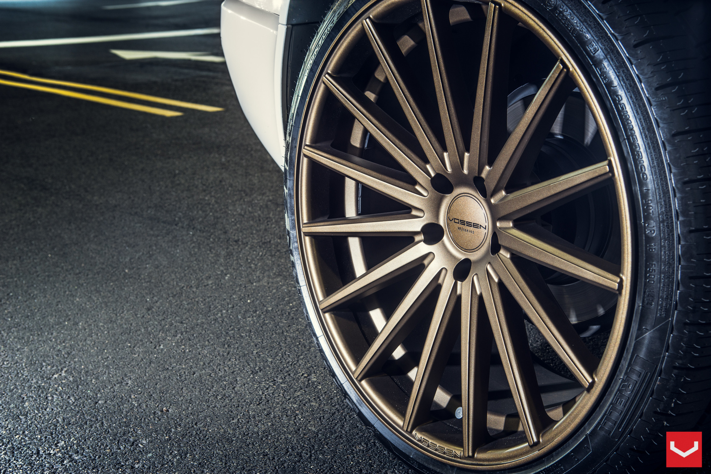 White BMW X5 on Custon Bronze Vossen Rims - Photo by Vossen