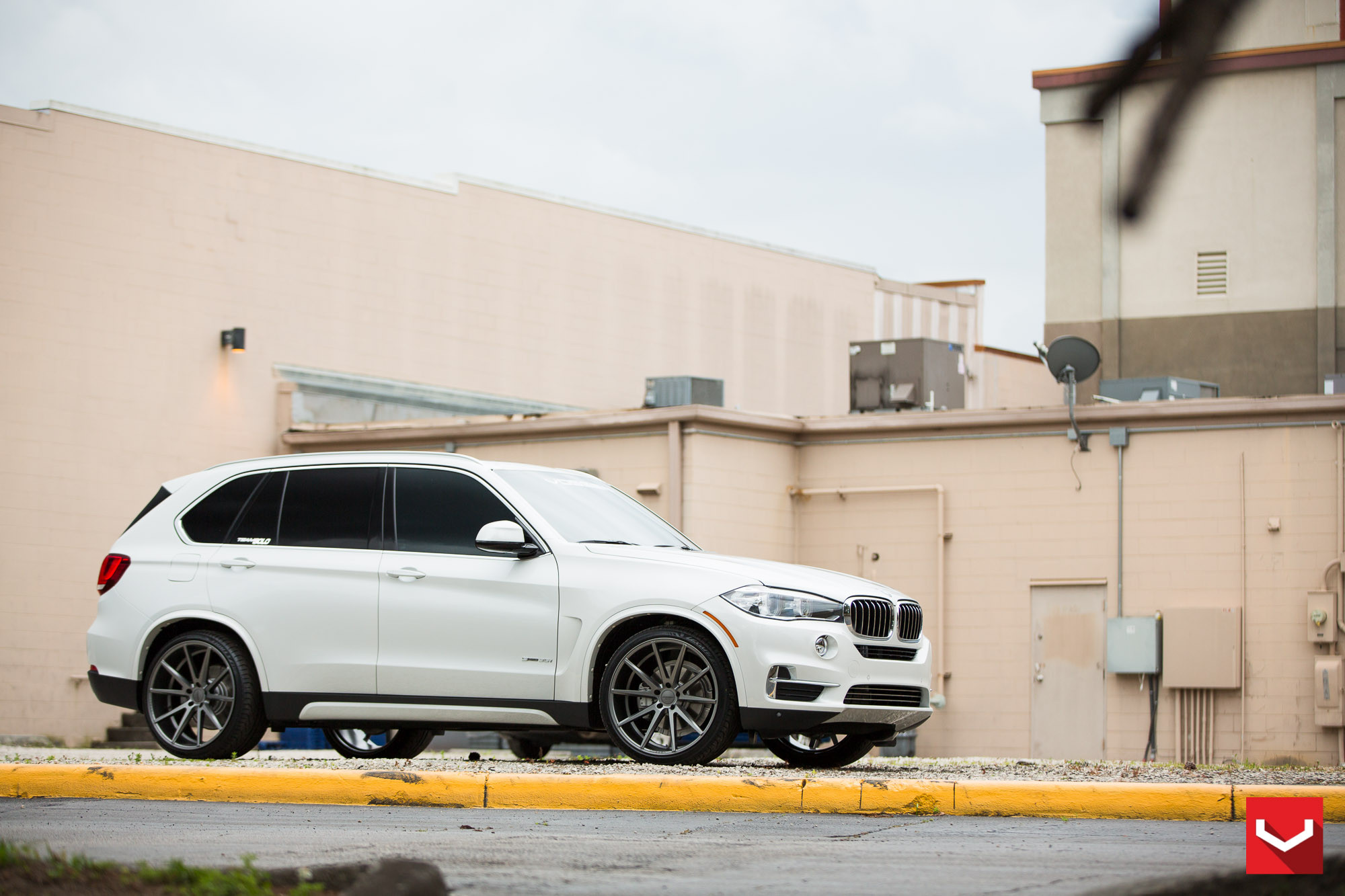 Custom Bodyside Moldings on White BMW X5 - Photo by Vossen